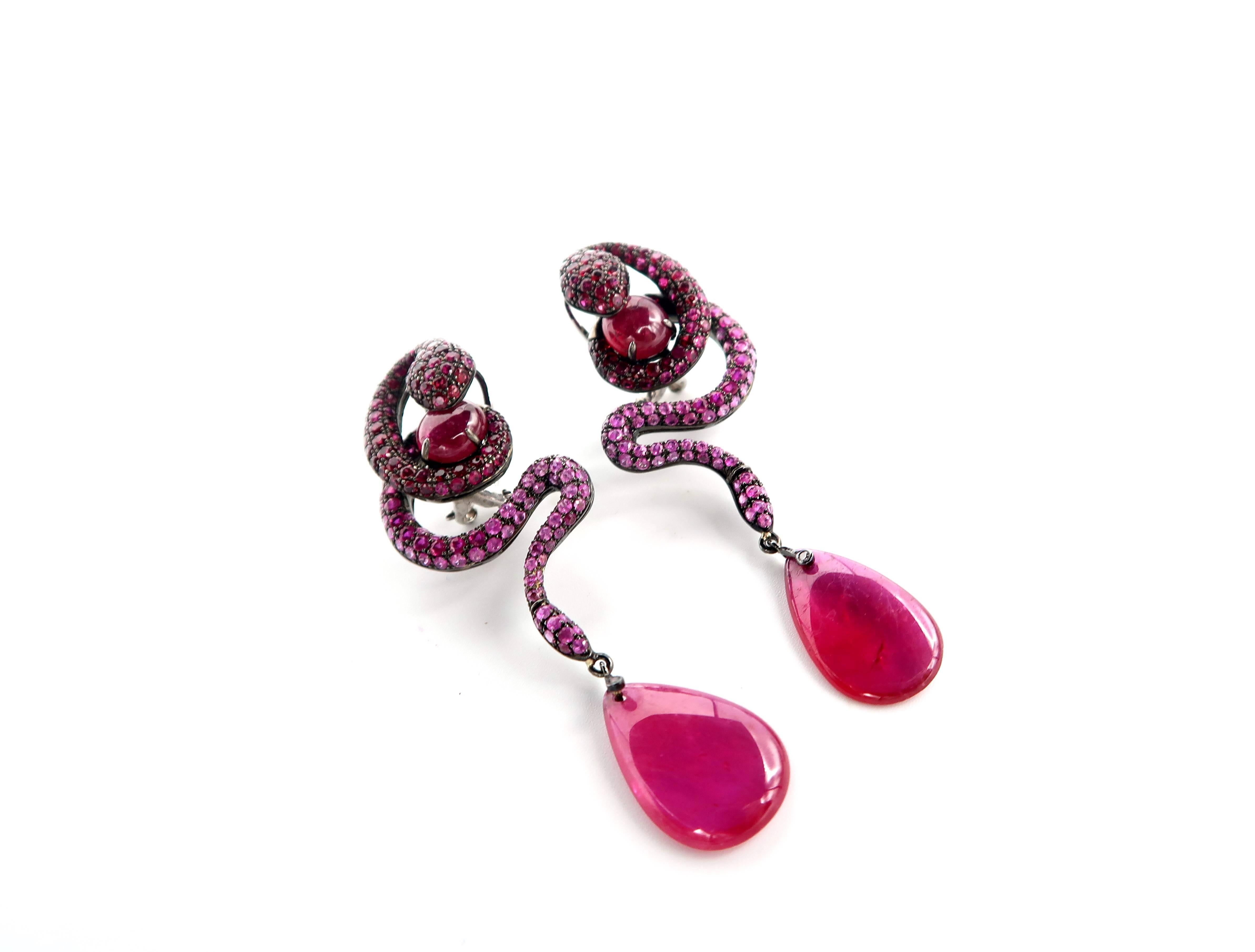 Serpent Snake 27.72 carat Ruby 18K White Gold Dangle Drop Earrings

Ruby : 27.72cts. in total
Gold : 18K White Gold 24.10g.