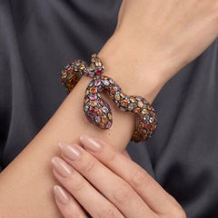 Bracelet « Serpent » en argent et argent doré, avec des saphirs multicolores et une taille « rose »