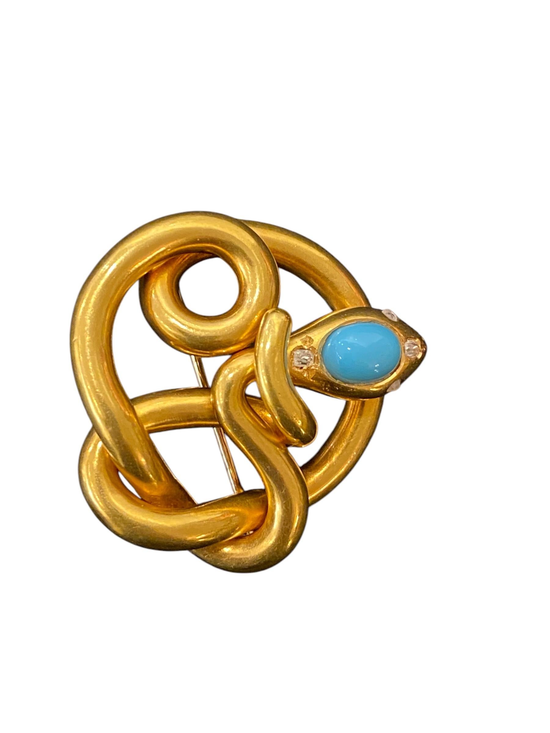 Brosche aus 19,2 kt - 800 ‰ Gelbgold , in Form einer Schlange. Der Körper windet sich um sich selbst, und der Kopf ist mit einem Cabochon-Türkis, zwei Diamanten im alten europäischen Schliff und zwei Diamanten im Rosenschliff besetzt. Portugiesisch,