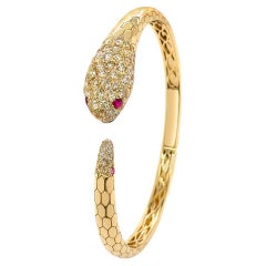 Bracelet serpent en or jaune 18K avec rubis et diamants blancs