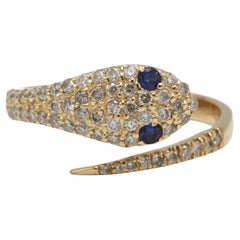 Serpent Ring in Gold with Diamonds and Sapphire Eyes — 0.44 ct