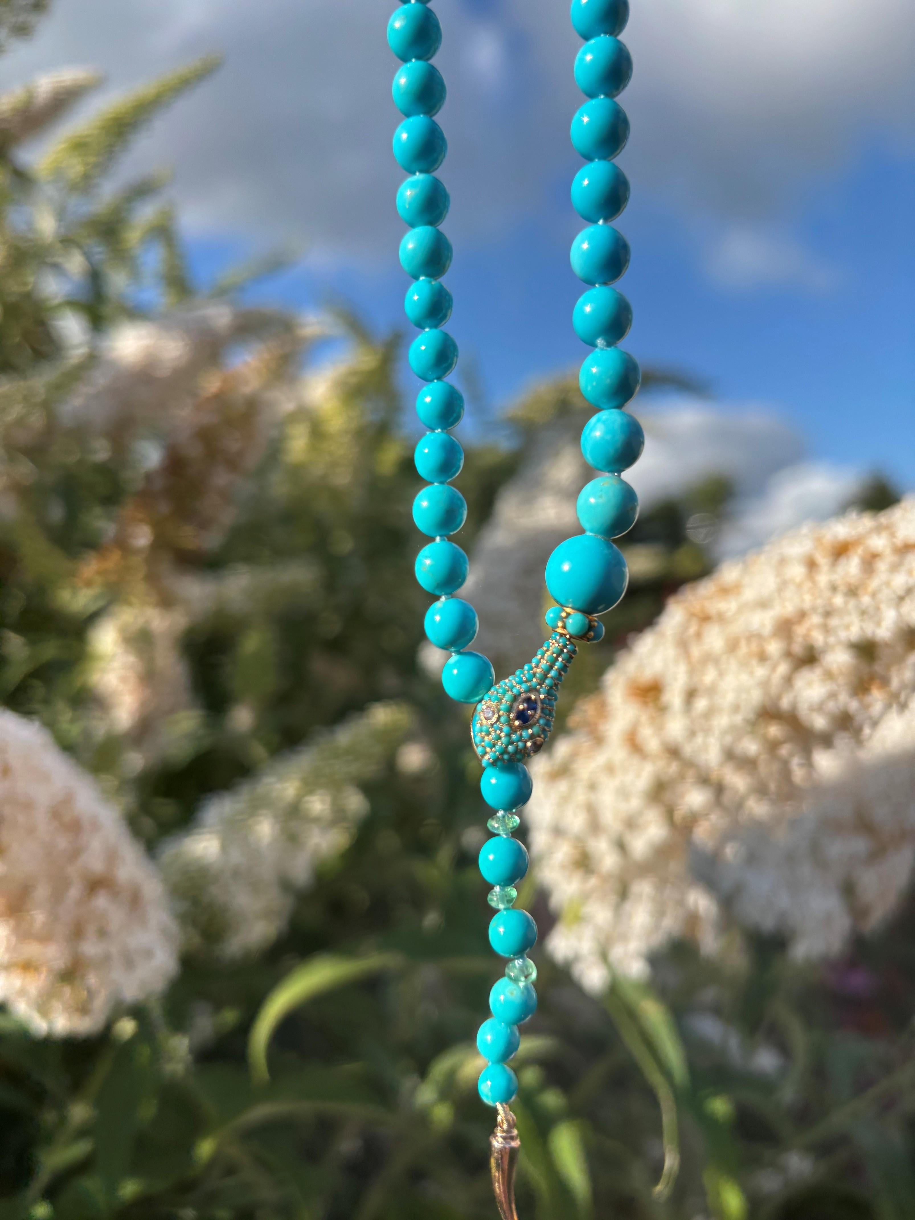 A regal giant 29 inch long handcrafted necklace with extremely rare and pure untreated Sleeping Beauty Turquoises, natural diamonds, colombian emeralds and genuine sapphires. This necklace features fine true Robinson Egg Blue turquoises from the