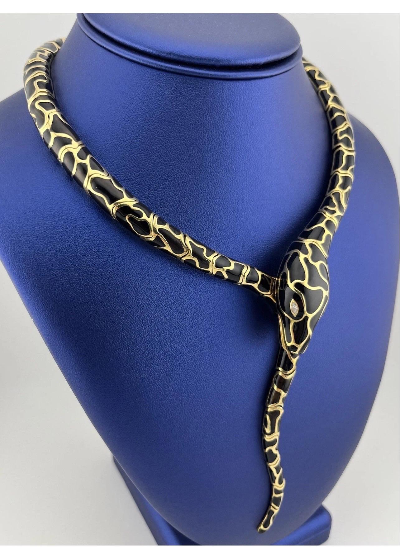 Unleash bold sophistication with this captivating Italian serpent necklace, a luxurious symbol of strength, transformation, and eternal elegance. Meticulously crafted in gleaming 18k yellow gold, the necklace coils gracefully around the neckline in