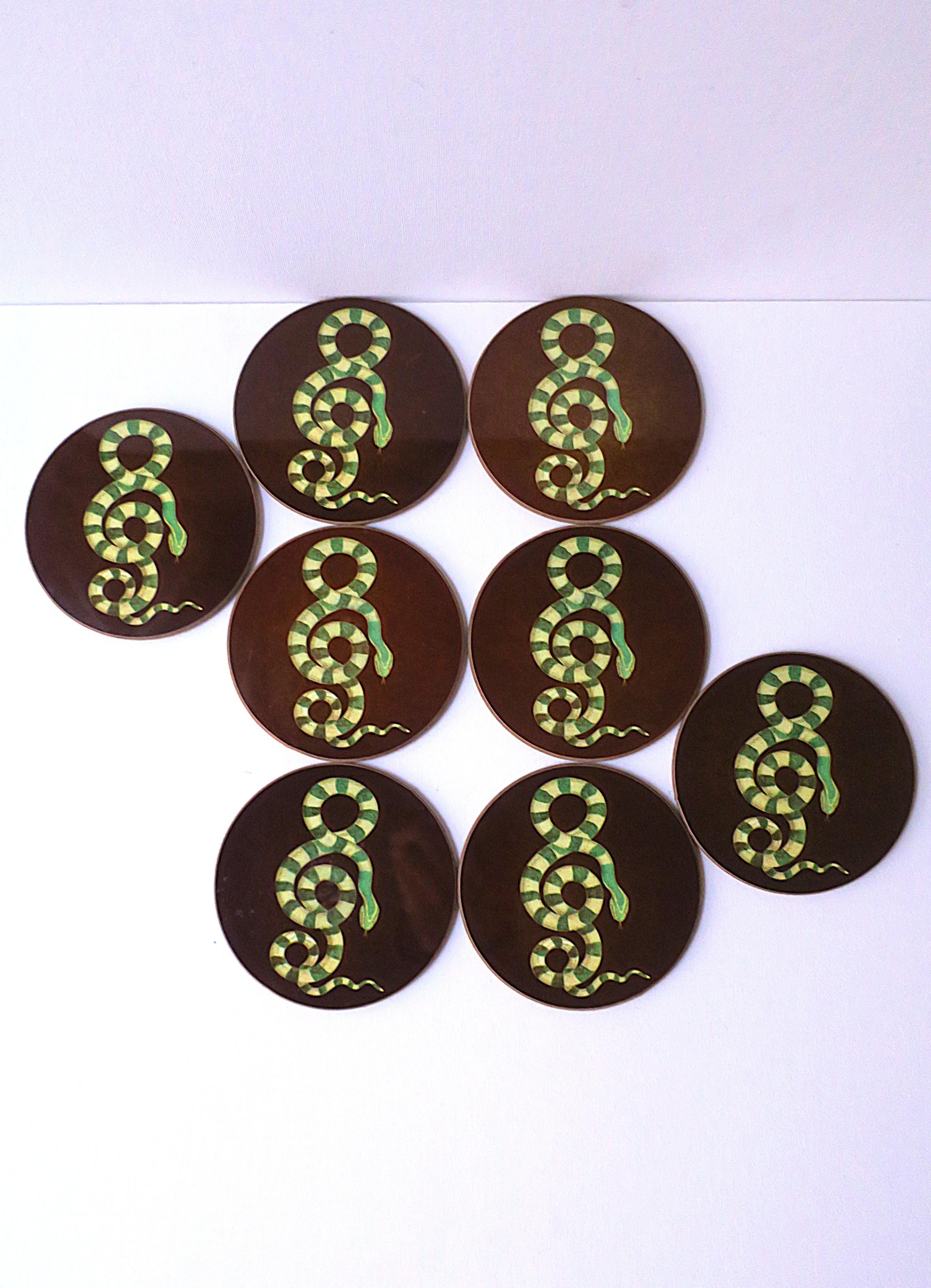 A great set of eight (8) serpent snake cocktail drinks coasters. Coasters feature a bright green 'rattlesnake' in a twist coil design with a rich brown ground/background. A great addition to any bar, bar cart, cocktail table, end/side/drinks table,