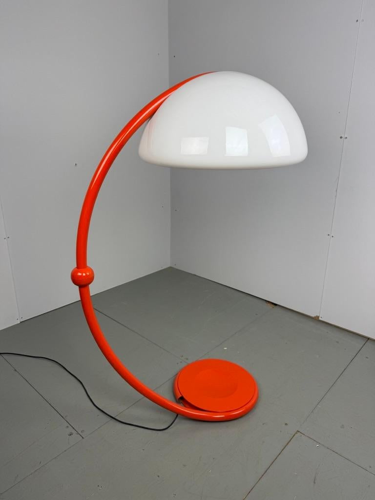 This iconic lamp is an excellent example of lighting design which is influenced by nature and is an outstanding design of the 20th century. Designed by Elio Martinelli for Martinelli Luce, Italy in 1965. It's named Serpente, that was Elio's