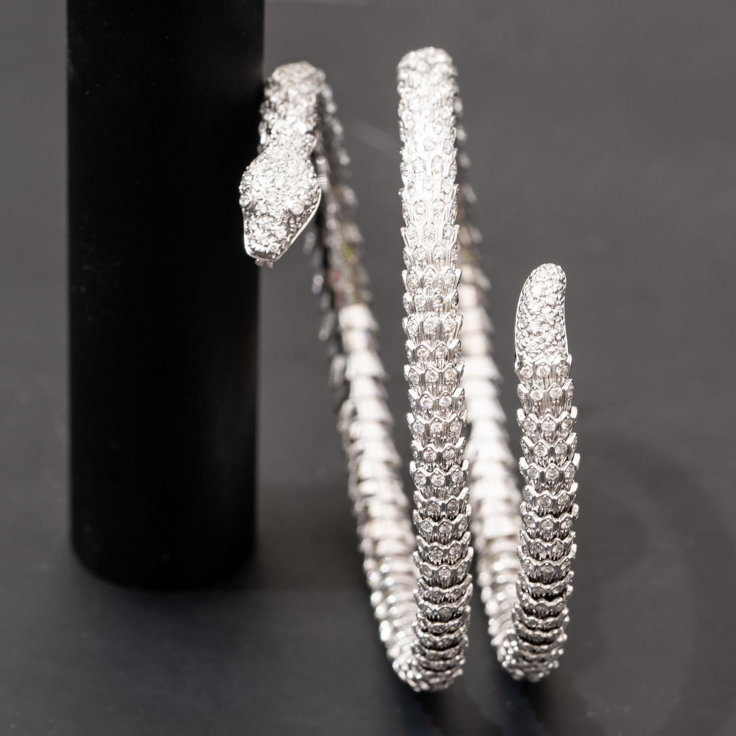 There is an elegance and exotic flavor with every diamond carefully placed on each scale of this magnificent serpent. One of a kind wrap bracelet for a unique kind of woman, Featuring 5.65 carat natural diamonds D VS, 56 gram white gold 18K.

This