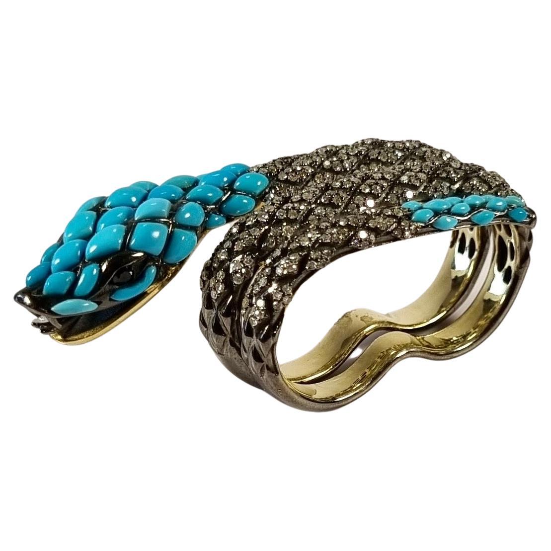 Serpenti Bague en argent et or 18 carats avec turquoises, saphirs et diamants en vente