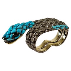 Serpenti Bague en argent et or 18 carats avec turquoises, saphirs et diamants
