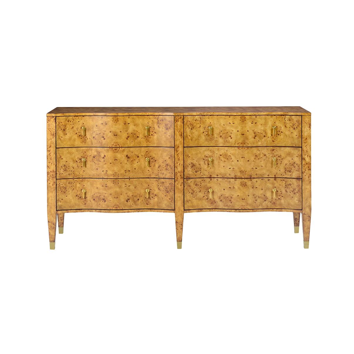 Crafted with luxurious amber mappa burl wood veneer, this dresser features a stunning serpentine front, highlighting its graceful curves and intricate wood grain patterns. With six spacious drawers adorned with elegant brass hardware, it provides