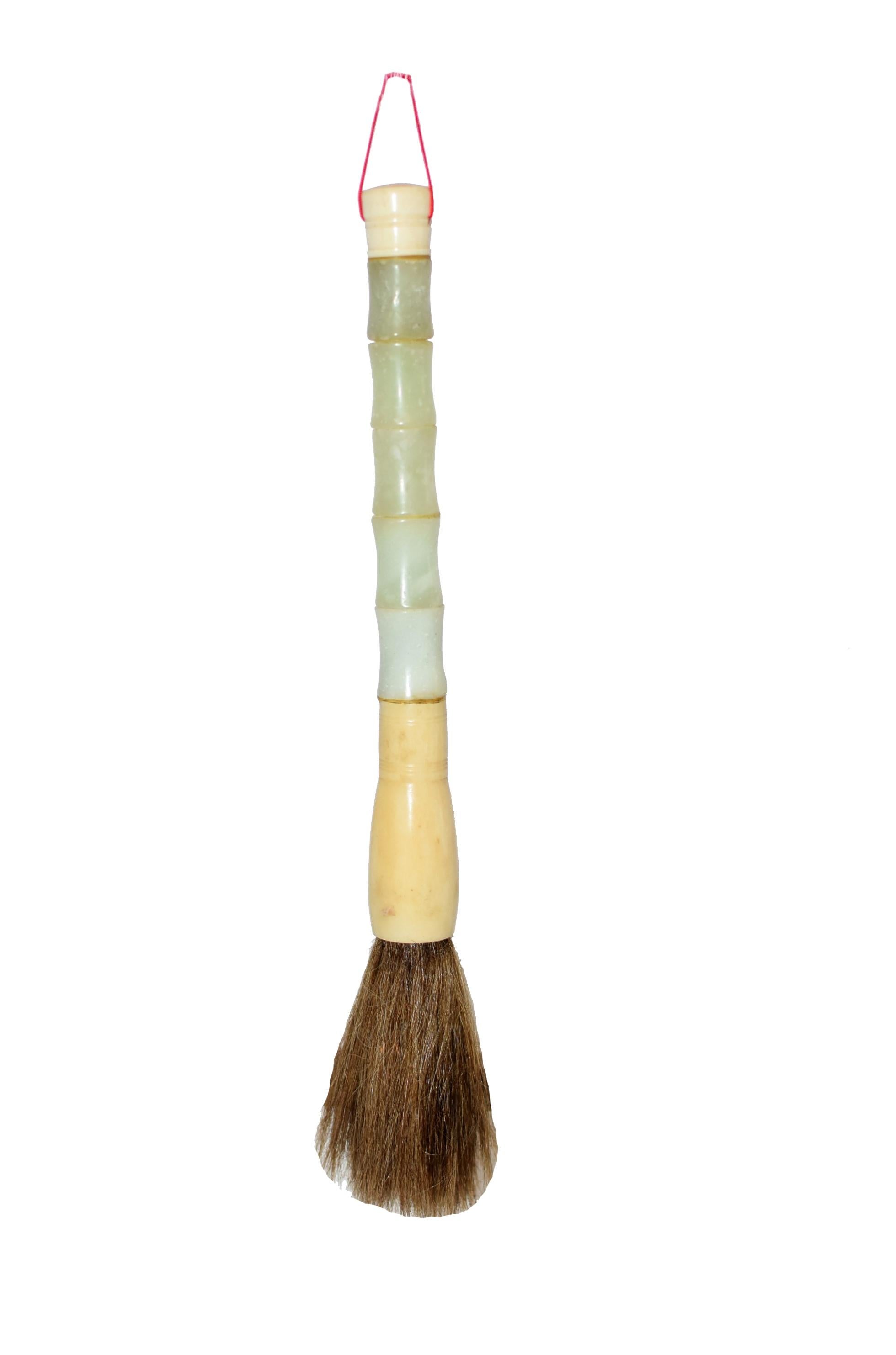 This special collection consists two vintage handmade serpentine brushes in bamboo forms. Bone ferrules with horse hair. Perfect for making calligraphy or painting, or simply as interior design elements. Measures: 12