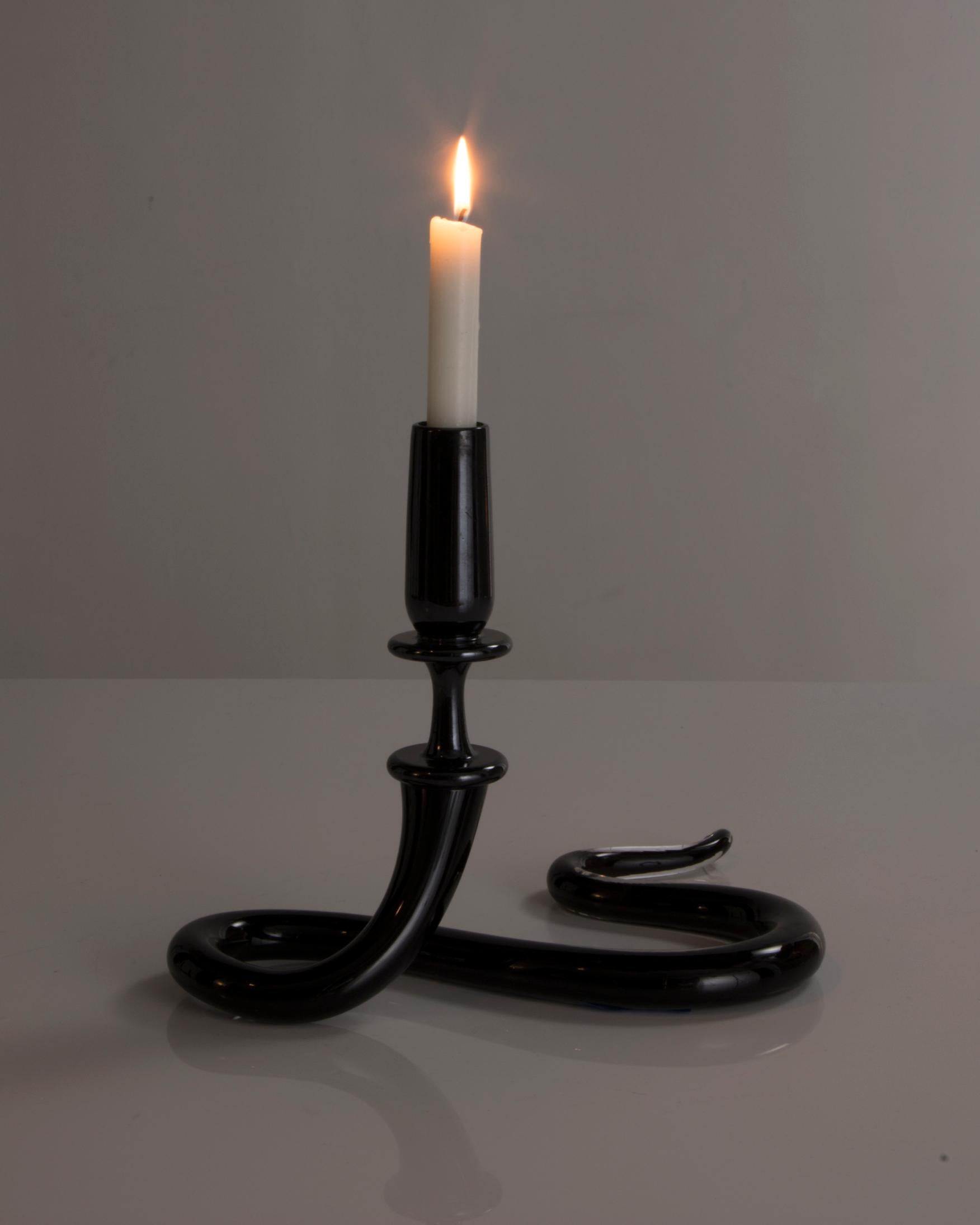 Unique single serpentine light sculpture in black hand blown glass. Designed and made by Jeff Zimmerman, USA, 2016.

Limited number available. Please note that each item may differ slightly in color and shape.
