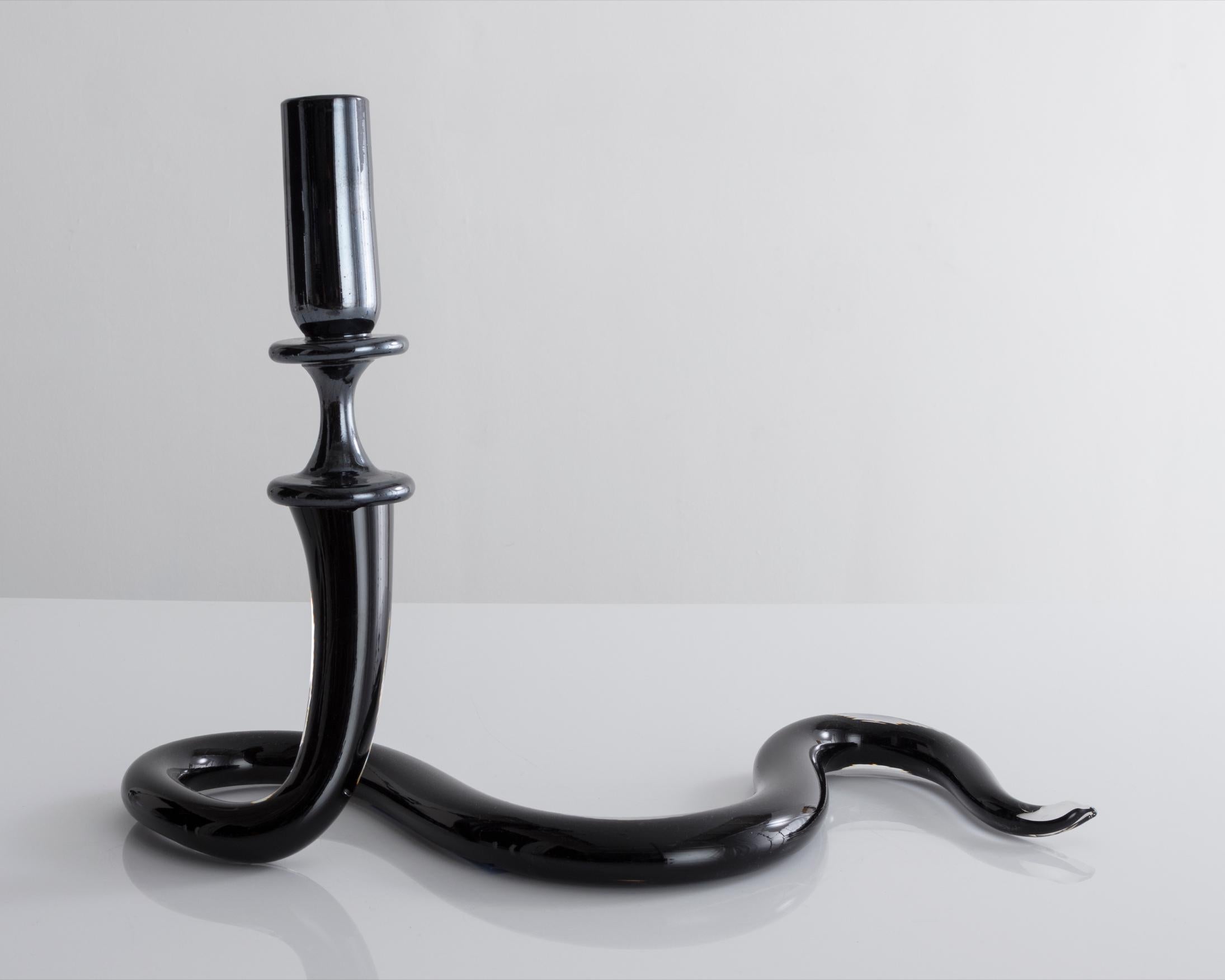 Unique single serpentine light sculpture in black hand blown glass. Designed and made by Jeff Zimmerman, USA, 2017.

Limited number available. Please note that each item may differ slightly in color and shape.