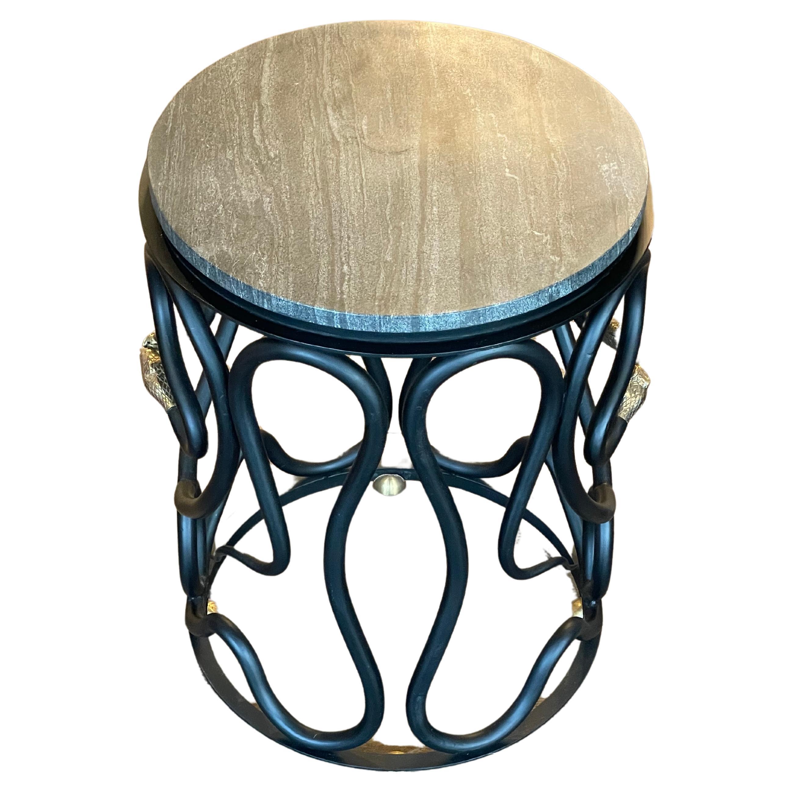Serpentine Paul Marra Side Table, with Cement Stone Top
Hand-forged ironwork
Fitted with brass snake head detailing
Handmade in Los Angeles, California


