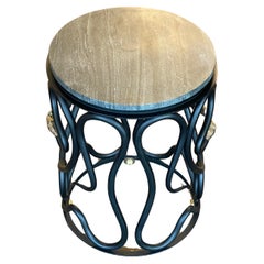 Mesa auxiliar con tapa de cemento Serpentine de Paul Marra