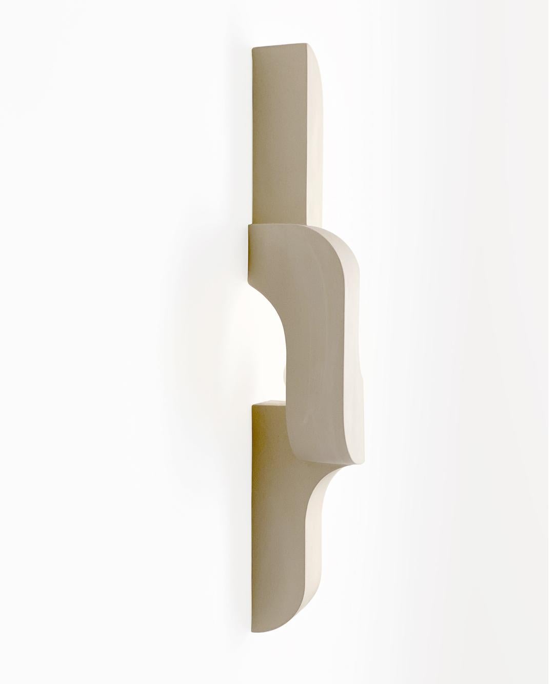 Serpentine Ceramic Wall Sconce - Mirrored pair In New Condition For Sale In Brooklyn, NY