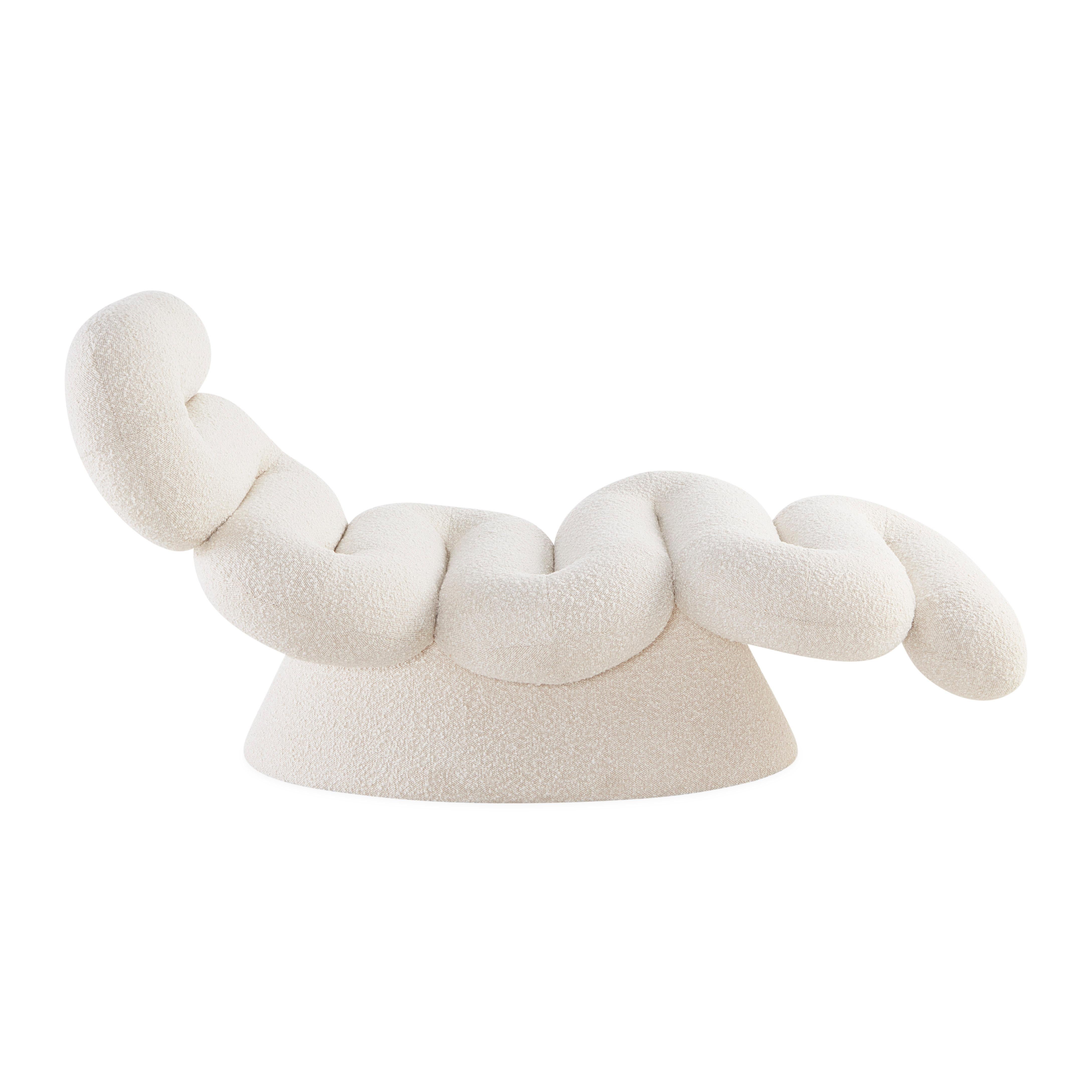 Pitched to match its curves to yours, our ultra-mod Serpentine Chaise is a thick and cushy tube-shaped seat wrapped in our luxe Olympus Oatmeal bouclé. Chic in a cozy corner, or double up and flank your fireplace.

Minimalist and modern but also