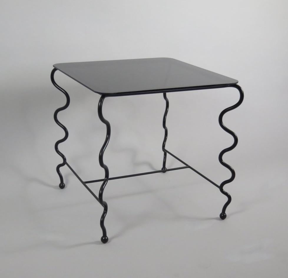 Mid-Century Modern 'Serpentine' Cocktail Table with Black Glass Top For Sale
