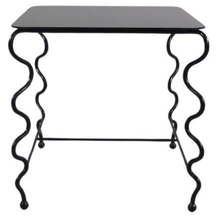 'Serpentine' Cocktail Table with Black Glass Top For Sale