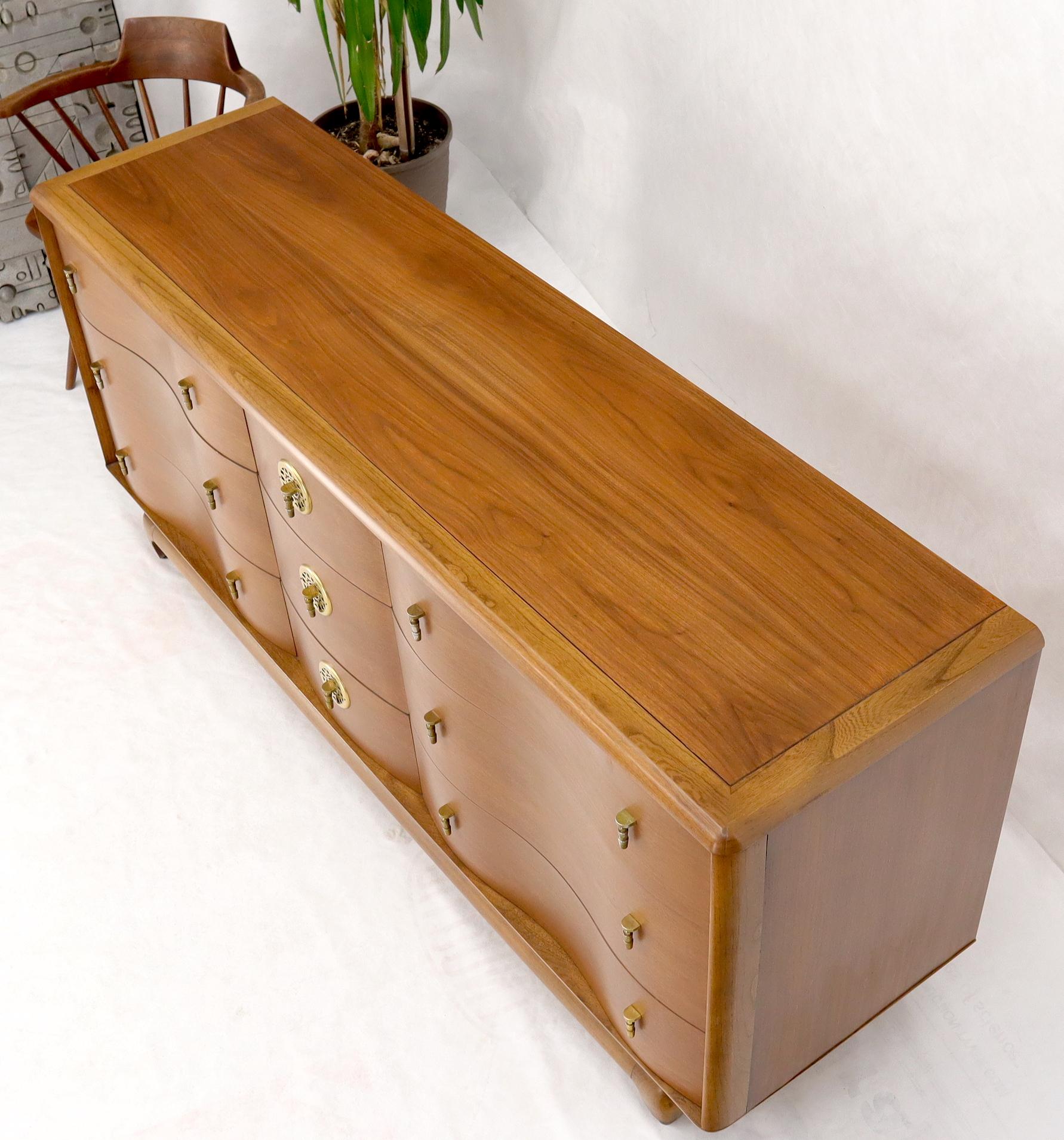 serpentine front dresser