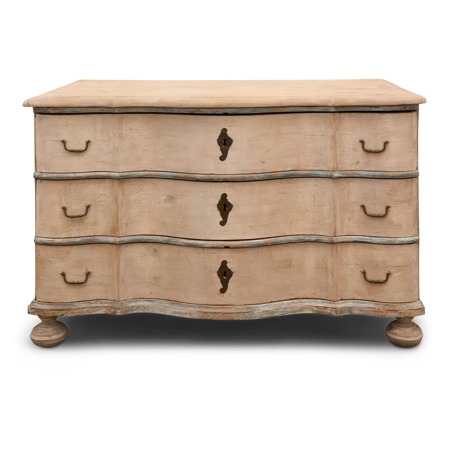 Serpentine front chest of drawers, hand carved in the 19th century, France. Subtle washed finish. All complete, sturdy in excellent condition. Nice, large scale.
