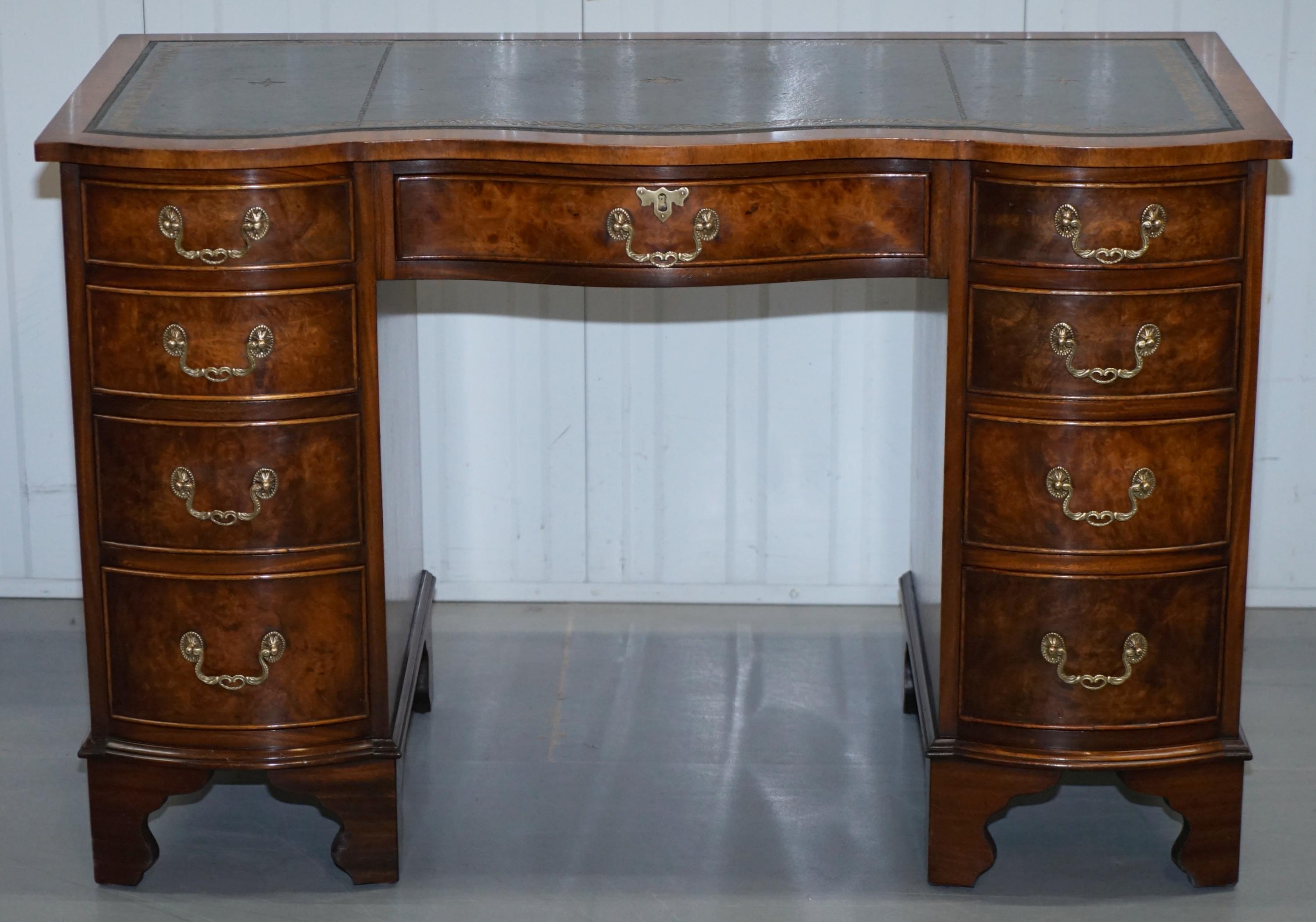 We are delighted to offer for sale this lovely vintage Serpentine fronted Burr or Burl Walnut twin pedestal knee hole partner desk with premium green leather writing surface 

A very good looking well made and ornate desk, its fully serpentine