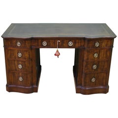 Antique Serpentine Fronted Mahogany Pedestal Desk by Waring and Gillow