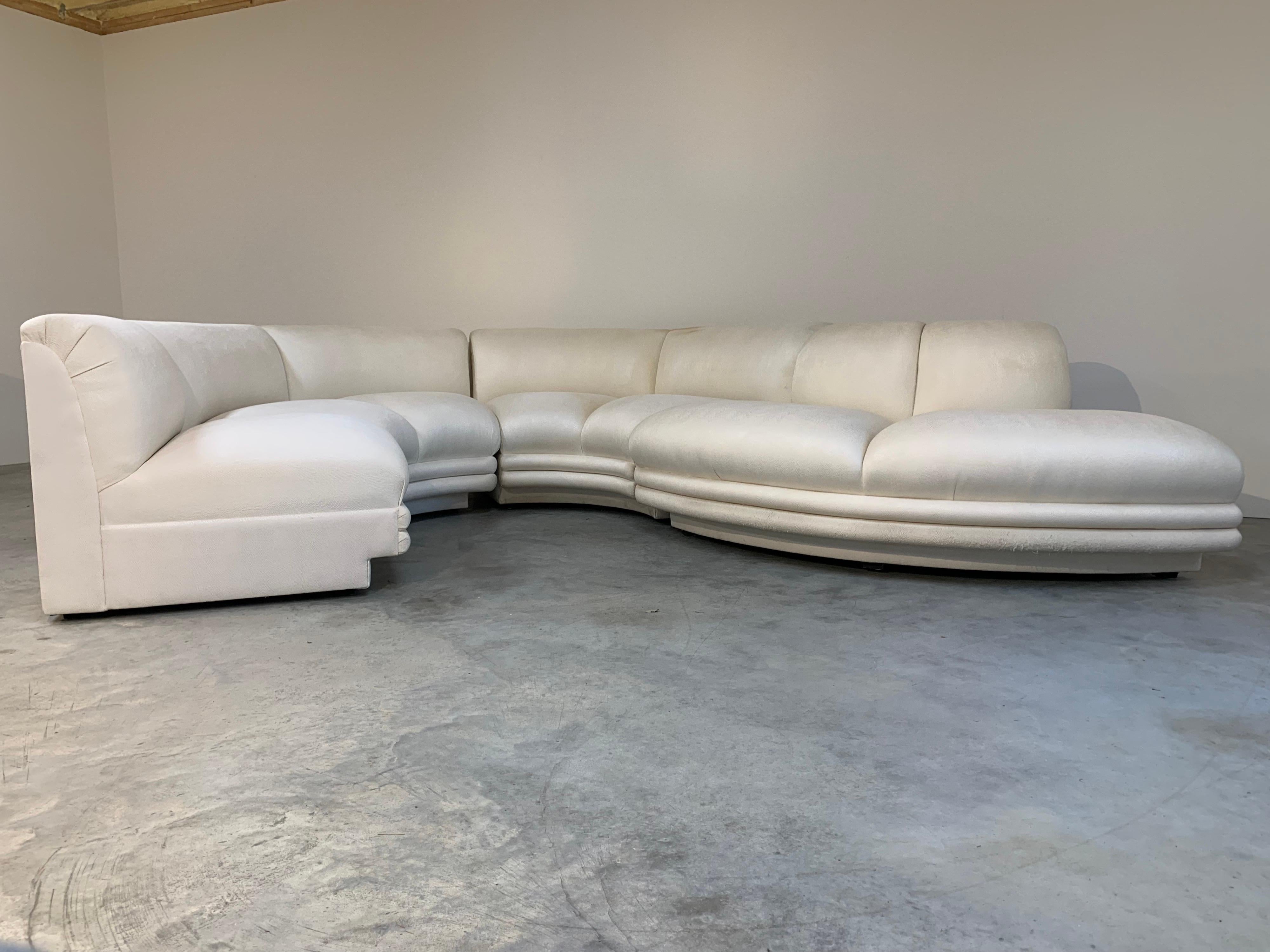 4 piece serpentine sectional sofa attributed to Weiman Preview circa 1980. Outstanding lines and construction. Upholstery is needed and there is a large water stain on the backrest as shown in image provided. 
Measurements: 
2 identical sections