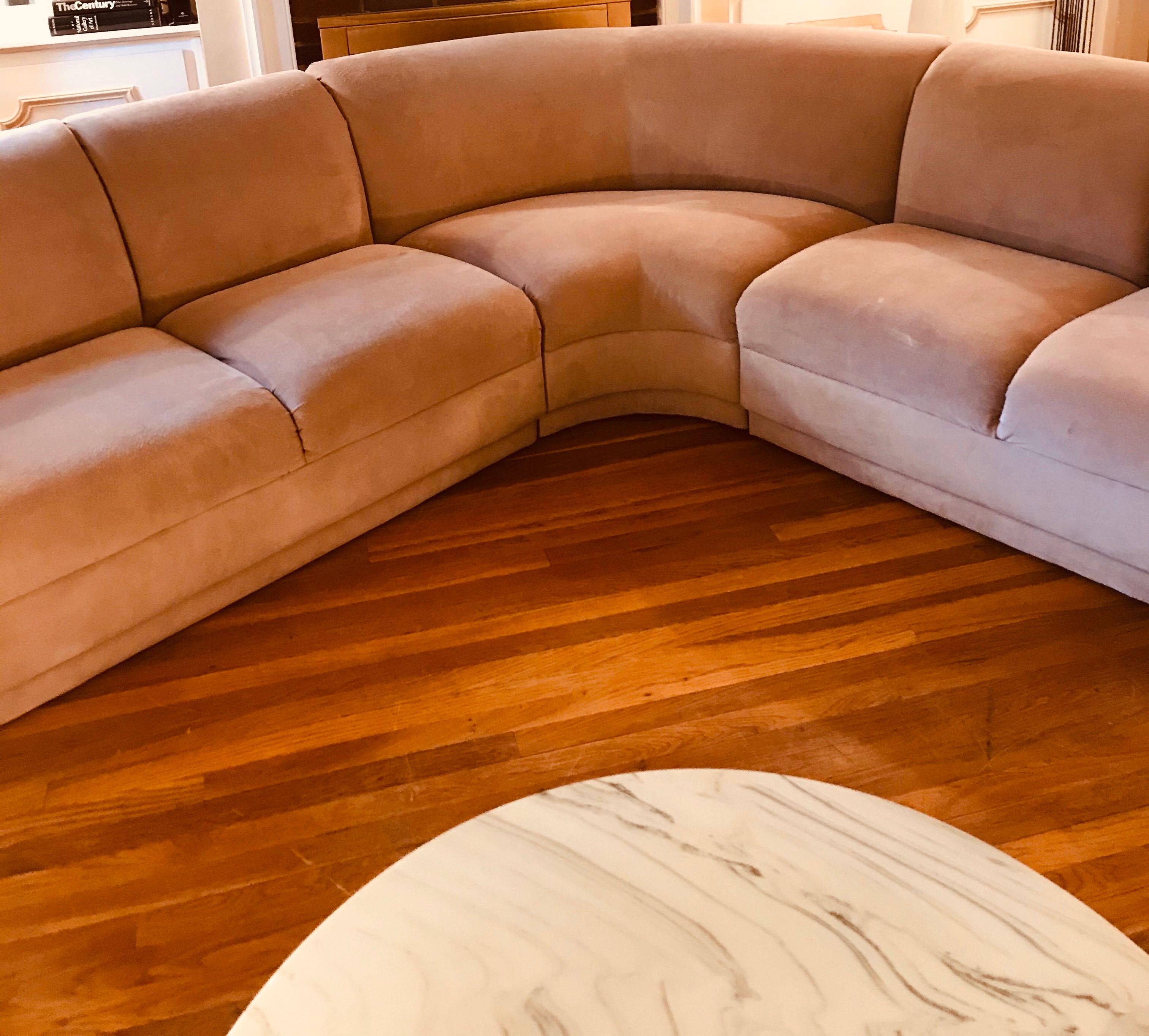 The most lovely sculptural sectional sofa, finished on all sides so that it may float in a room. The upholstery is all original in fantastic shape, the dusty blush hue is breathtaking. This sofa can work in myriad arrangements, if you’ll see