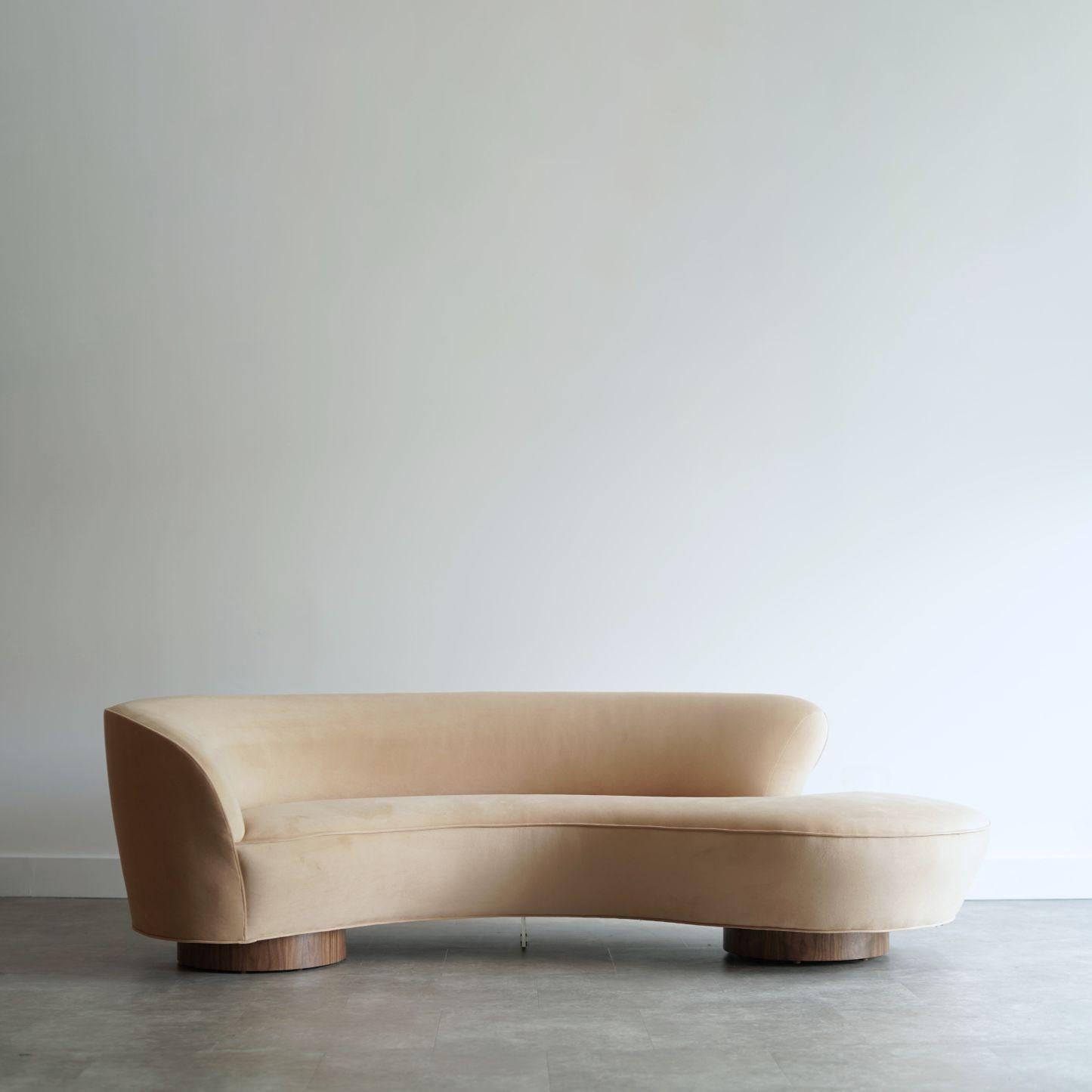 Iconic serpentine sofa designed by Vladimir Kagan for Directional, 1970s. This sculptural piece has been fully restored by Stamford Modern, including all-new interior foam and materials for enhanced comfort. Reupholstered in a natural velvet, it
