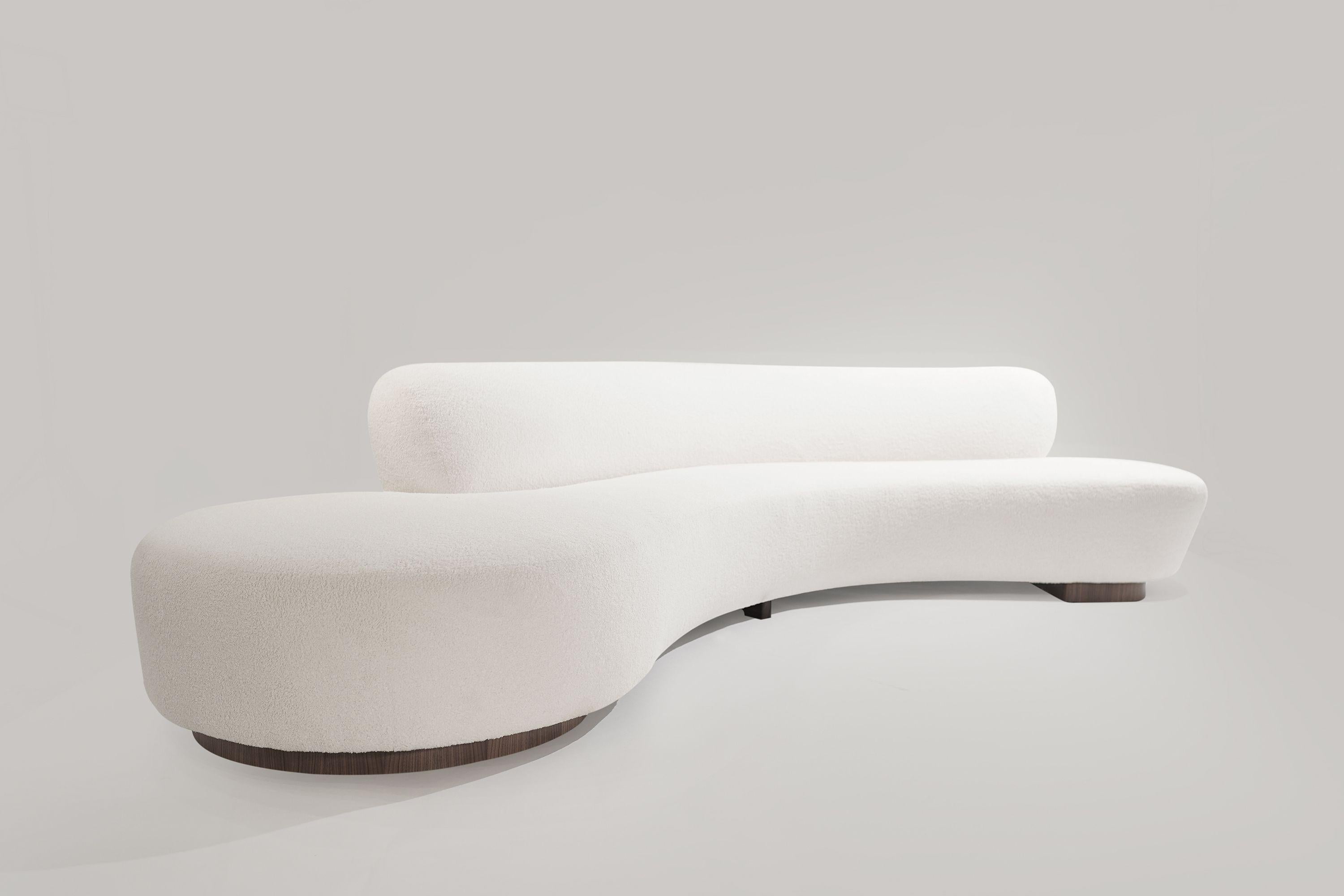 A stunning and rare Serpentine sofa, Model 150BS designed by architect and furniture designer Vladimir Kagan. It features a distinctive curved frame that gives this piece a delightful sensual design, assuring a striking proportioned profile view