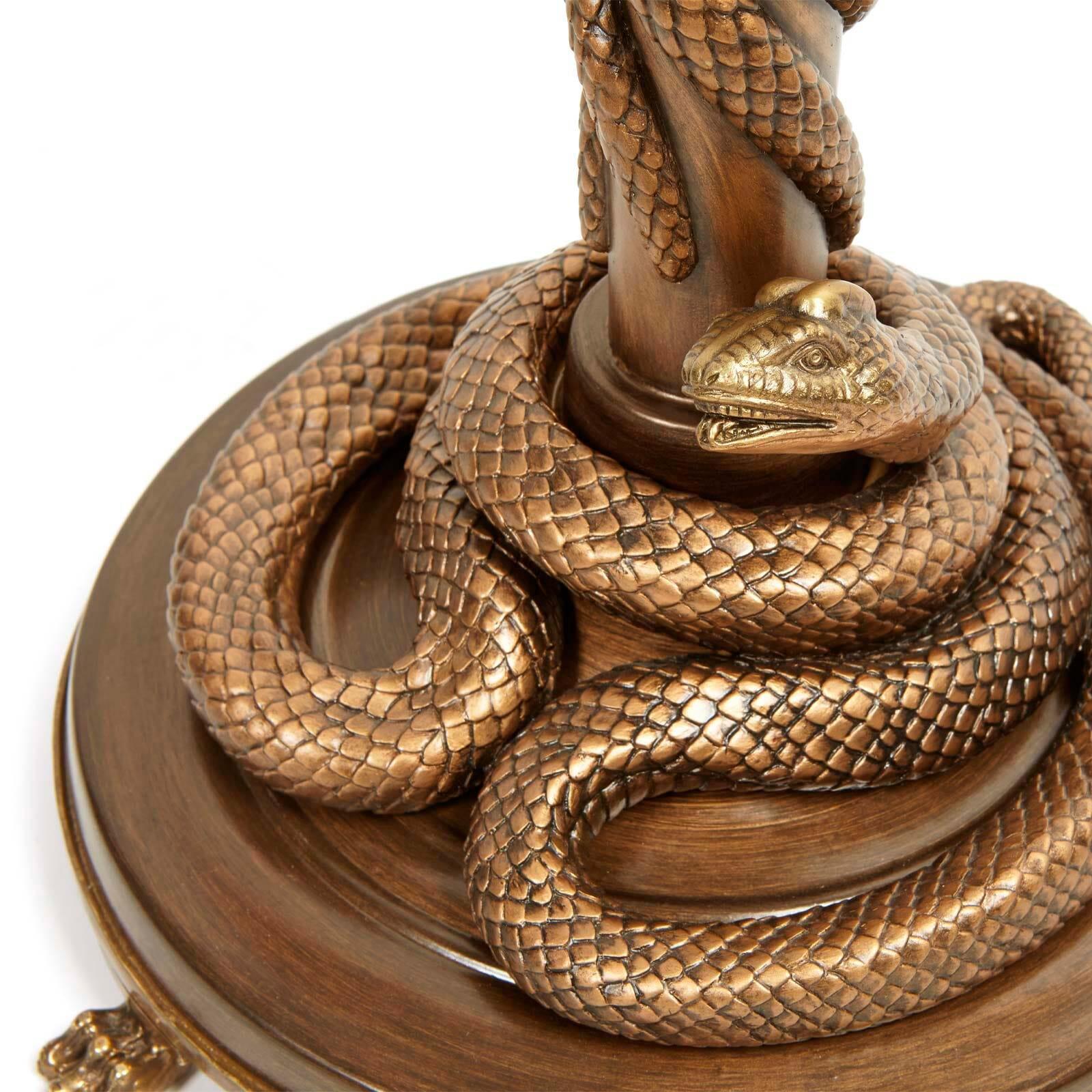 Placing a spotlight on the dark side of nature, the SERPENTIS lampstand is subversive in its beauty. Enwrapped by snakes House of Hackney's symbol of immortality around the base and all the way to the top, this decadent design is crafted in ceramic