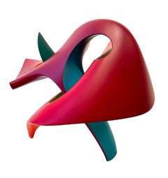 Abstrakte Skulptur einer Schlange, leuchtend farbige, ineinander verschlungene geometrische Form