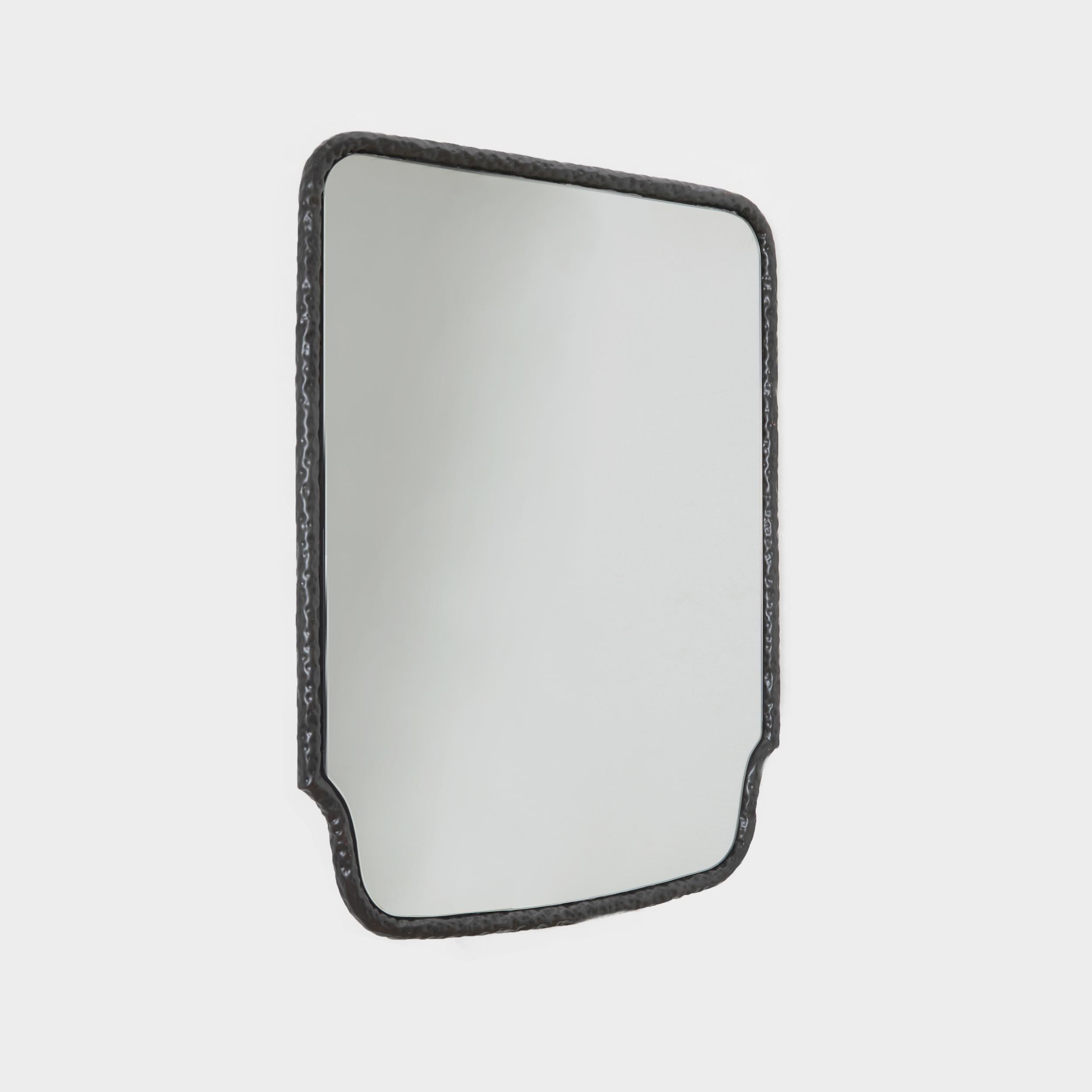 SERRALLÉS MIRROR, designed in 2025.

This Mirror has a decorative shape made from hammered brass. Crafted by skilled artisans in Northern Portugal.

Bespoke dimensions and finishes available upon request.

Production lead time: 8-10 weeks
