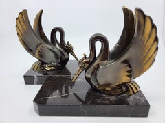 Serre Livres en Spelter sur marbre noir veiné Art Déco France XX Siècle