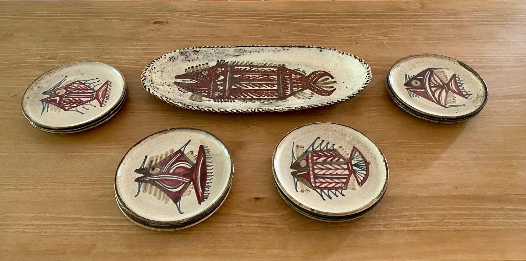 12 ceramic plates diameter : 24 cm
1 Large ceramic dish : 59 cm x 25 cm
All hand decorated with different stylized fishes by Gustave Reynaud / Atelier LE MURIER in Vallauris 1960's.
Very Nice condition.
