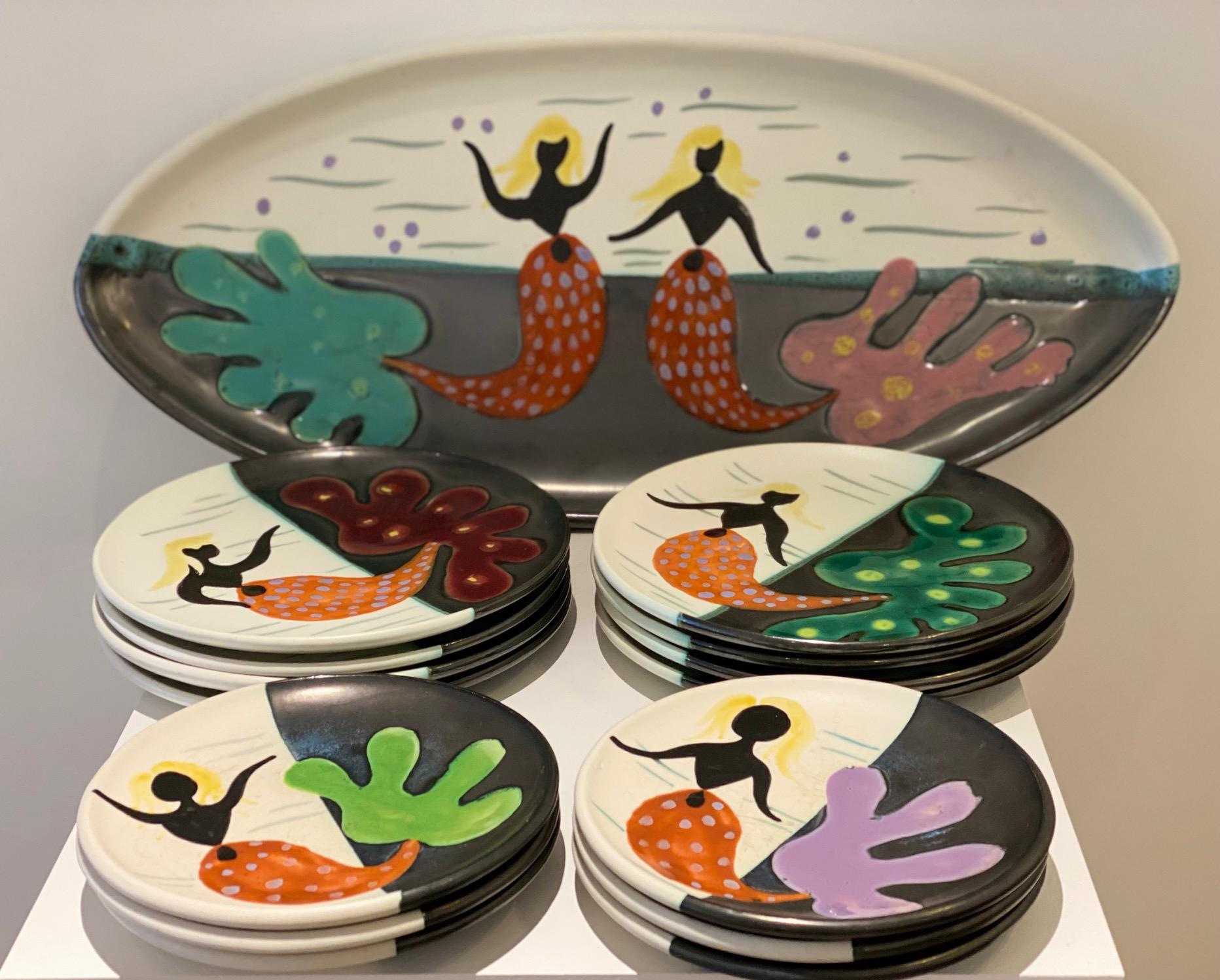 Unusual table service :
6 ceramic plates diameter 18 cm
8 ceramic plates diameter 22 cm
1 Large ceramic dish 
1 ceramic sauce boat
All hand decorated with Mermaids by Atelier Cerenne in Vallauris 1960's.
Atelier Cerenne was a famous ceramic workshop