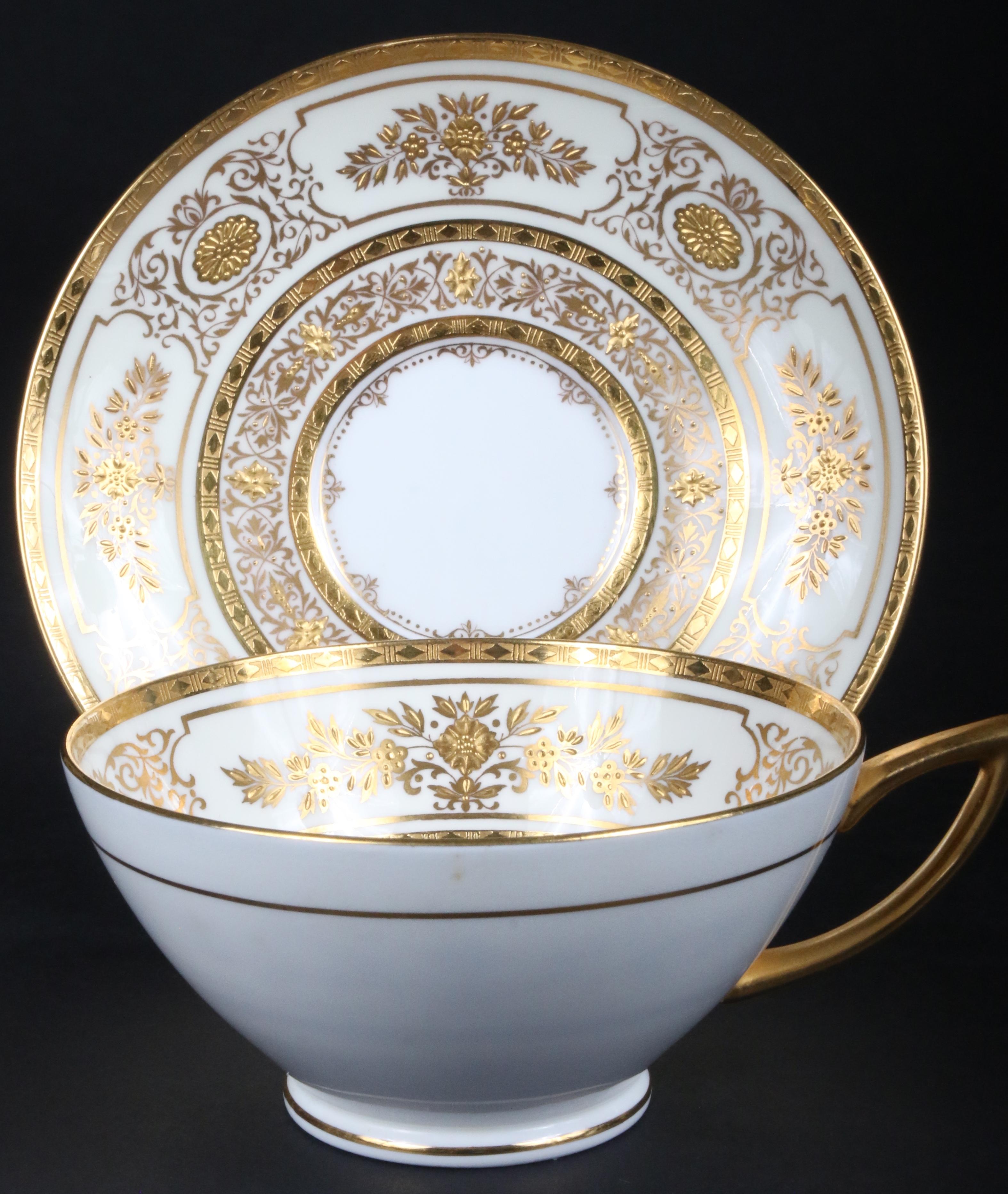 Service for 12 of Minton for Tiffany Ivory Gilded Plates For Sale 1