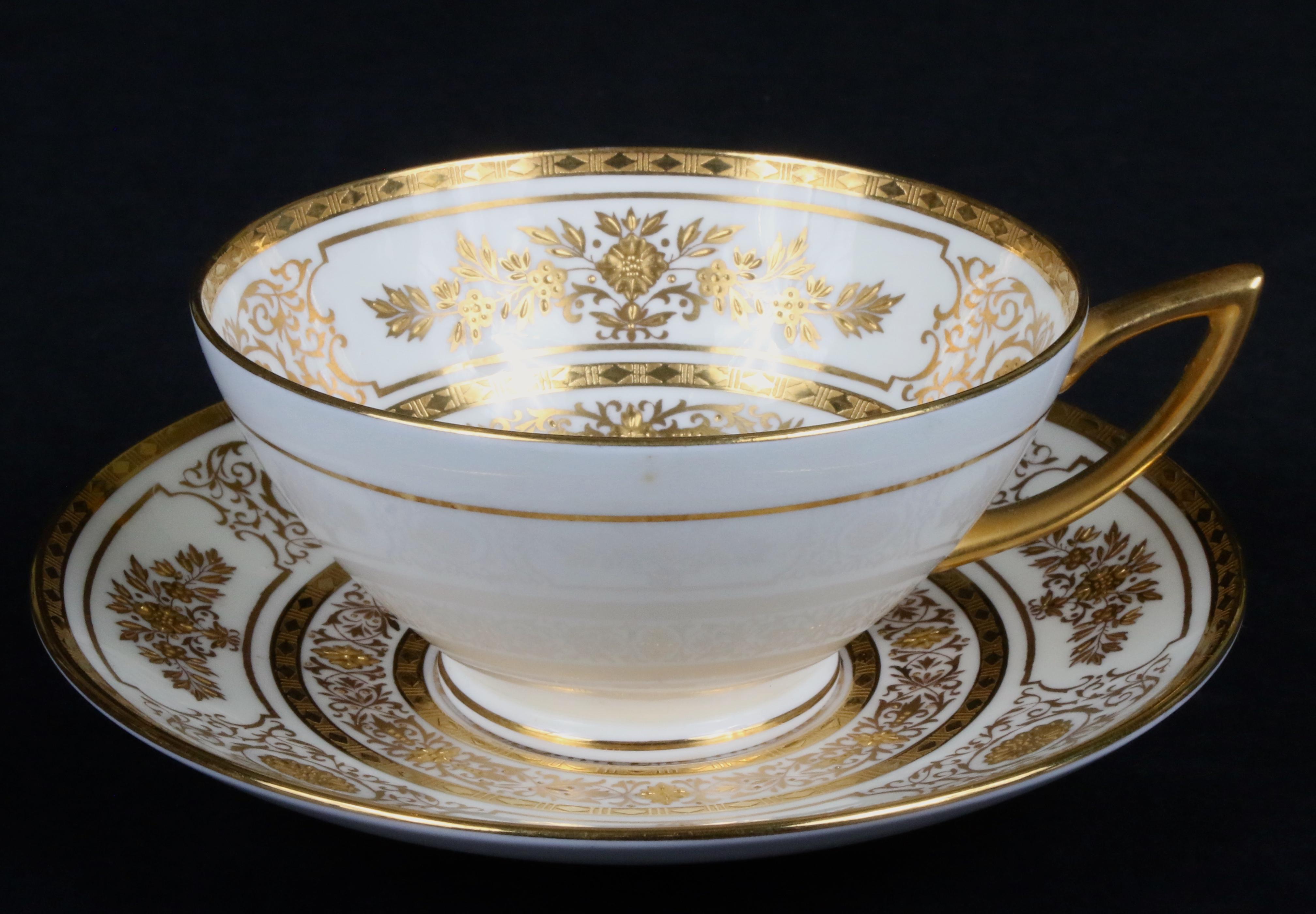 Service for 12 of Minton for Tiffany Ivory Gilded Plates For Sale 2