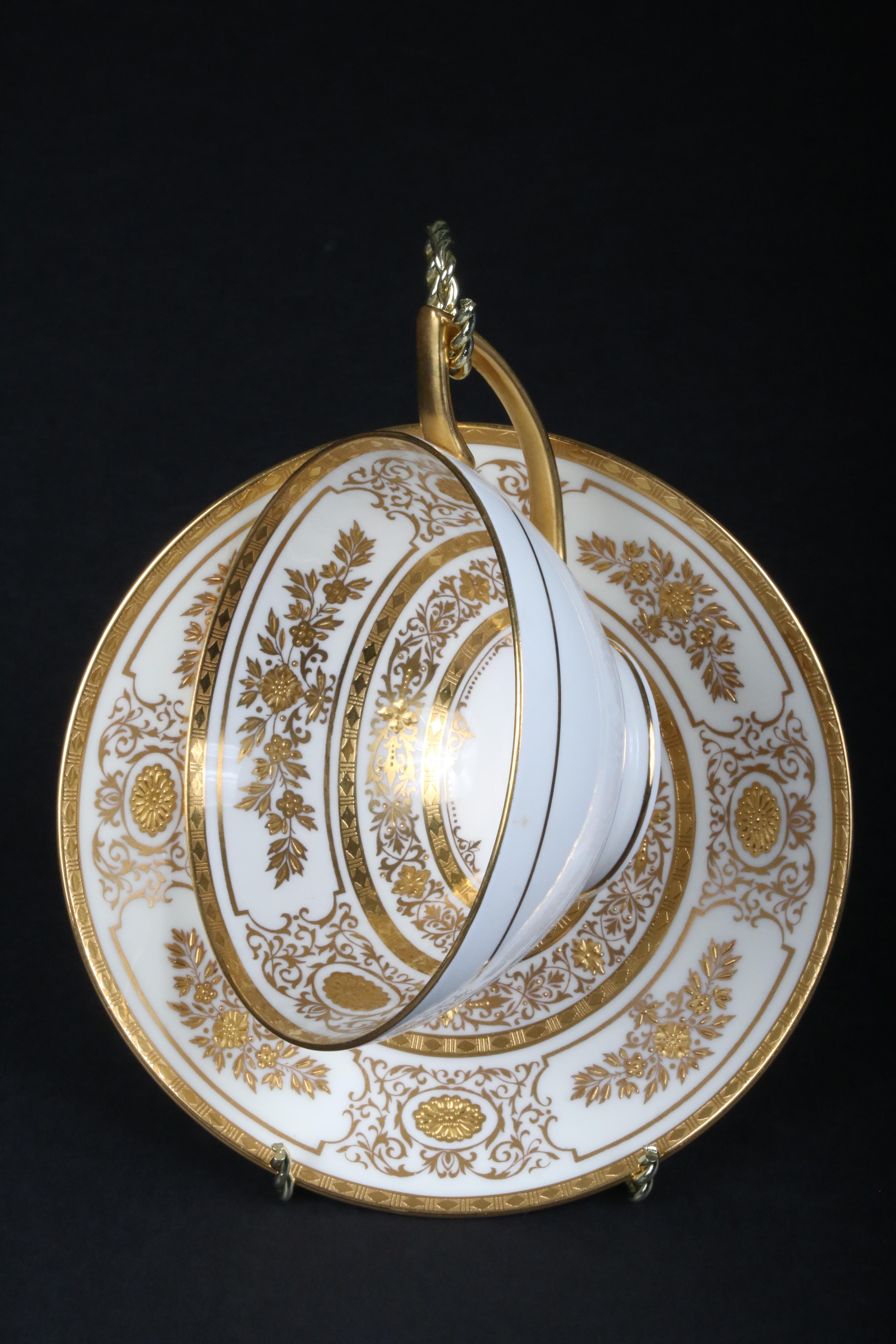 Service for 12 of Minton for Tiffany Ivory Gilded Plates For Sale 4