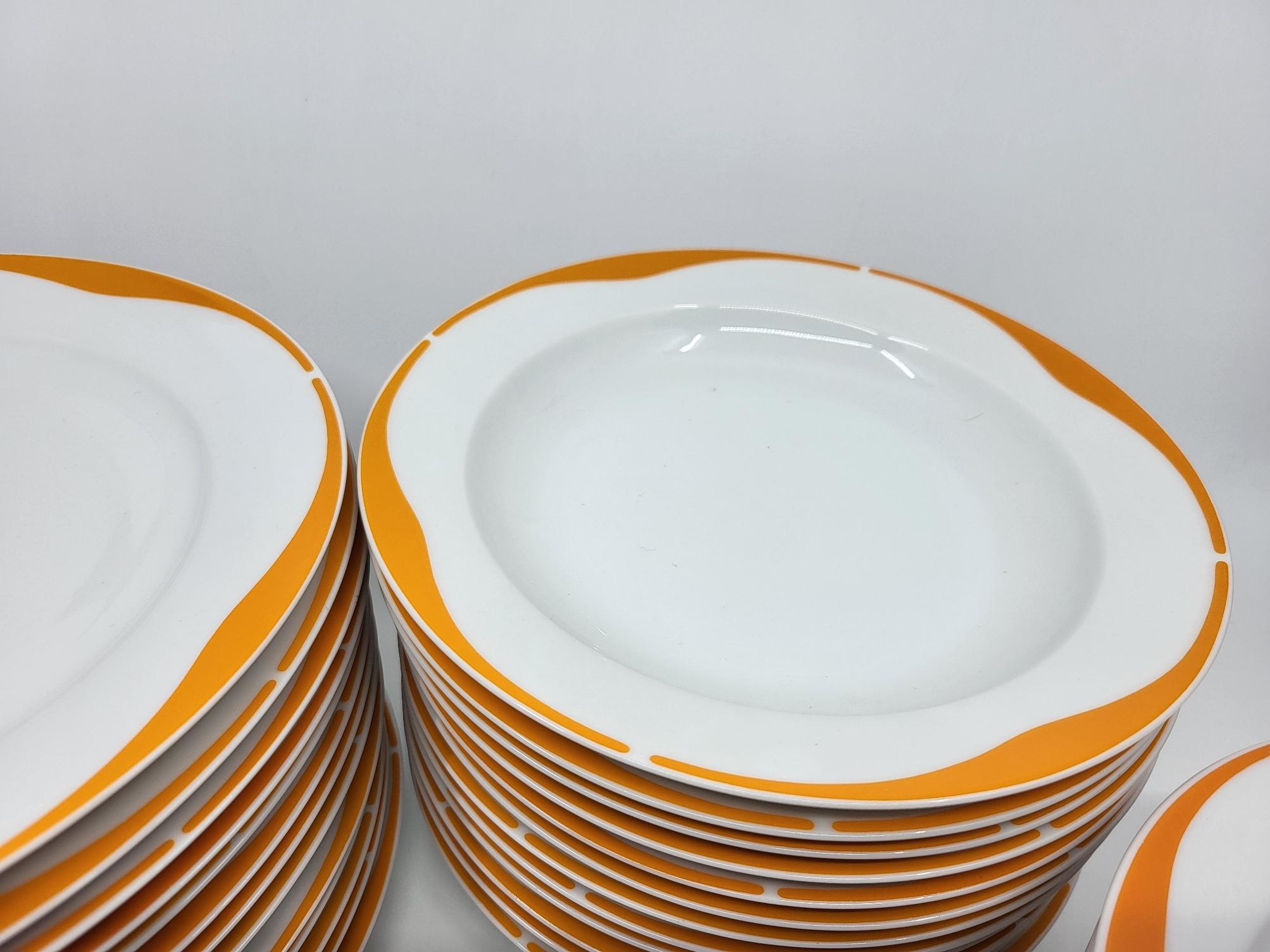 Servicio H&C Heinrich Alemania en porcelana blanca y naranja Alemania 1970 (73p) Porcelana en venta