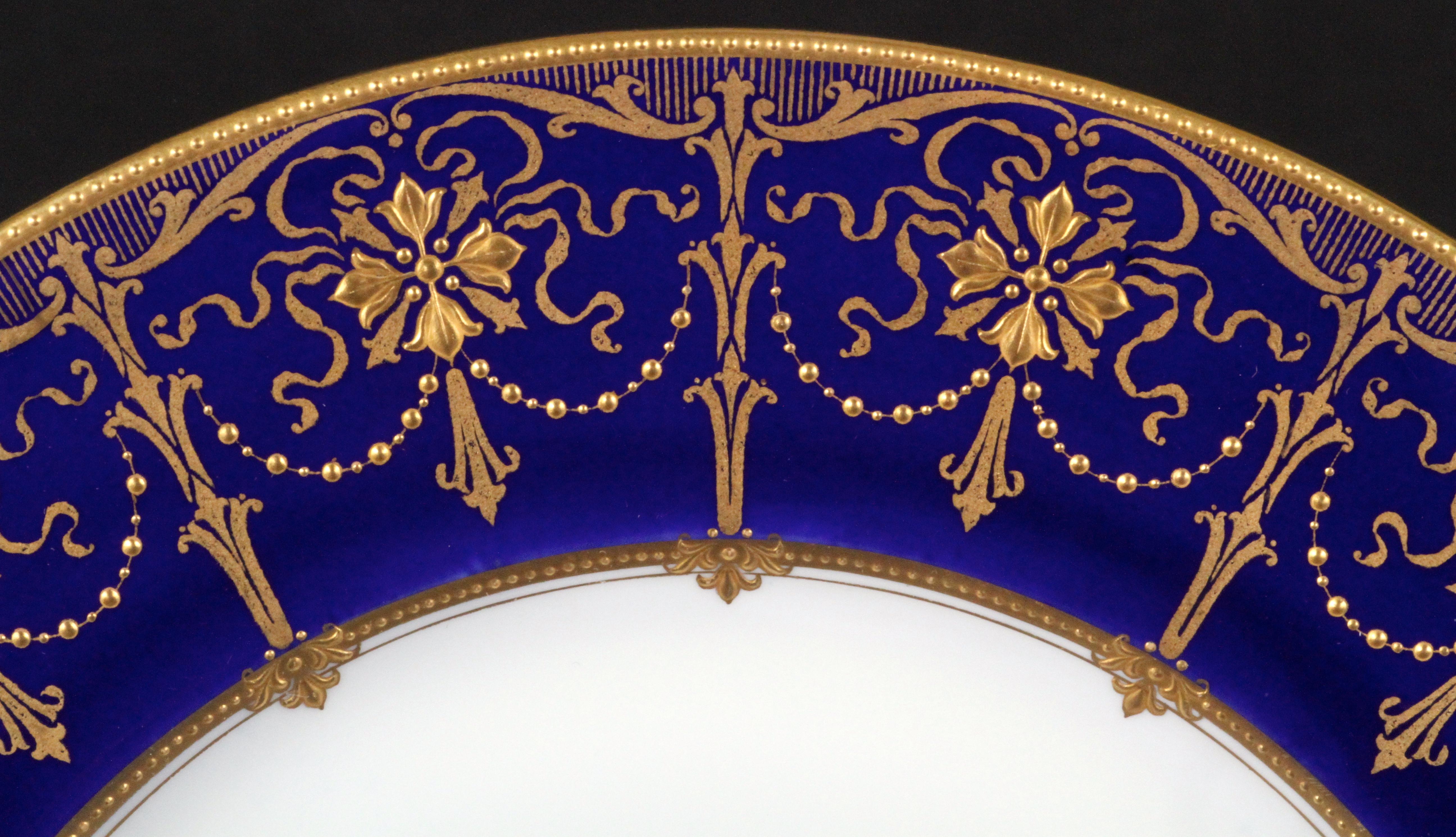 Early 20th Century Service of 24 Minton Cobalt Blue Gold-Encrusted Plates For Sale