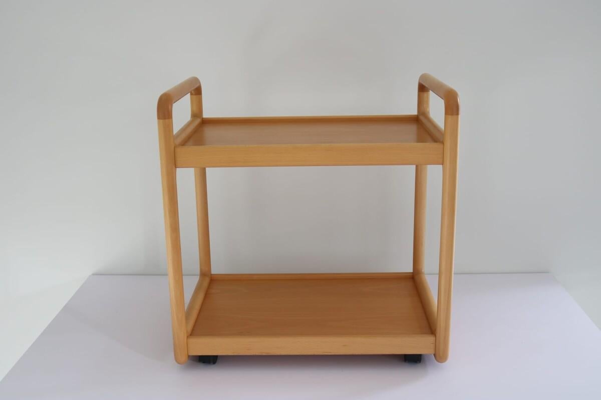 Service trolley made by designer Poul Cadovius forhis editor Cado. Produced in Denmark in the 1970's. The original attribution mark can be found at the bottom.