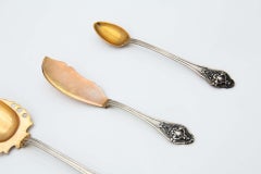 Serving cutlery set in gold-plated silver with shells