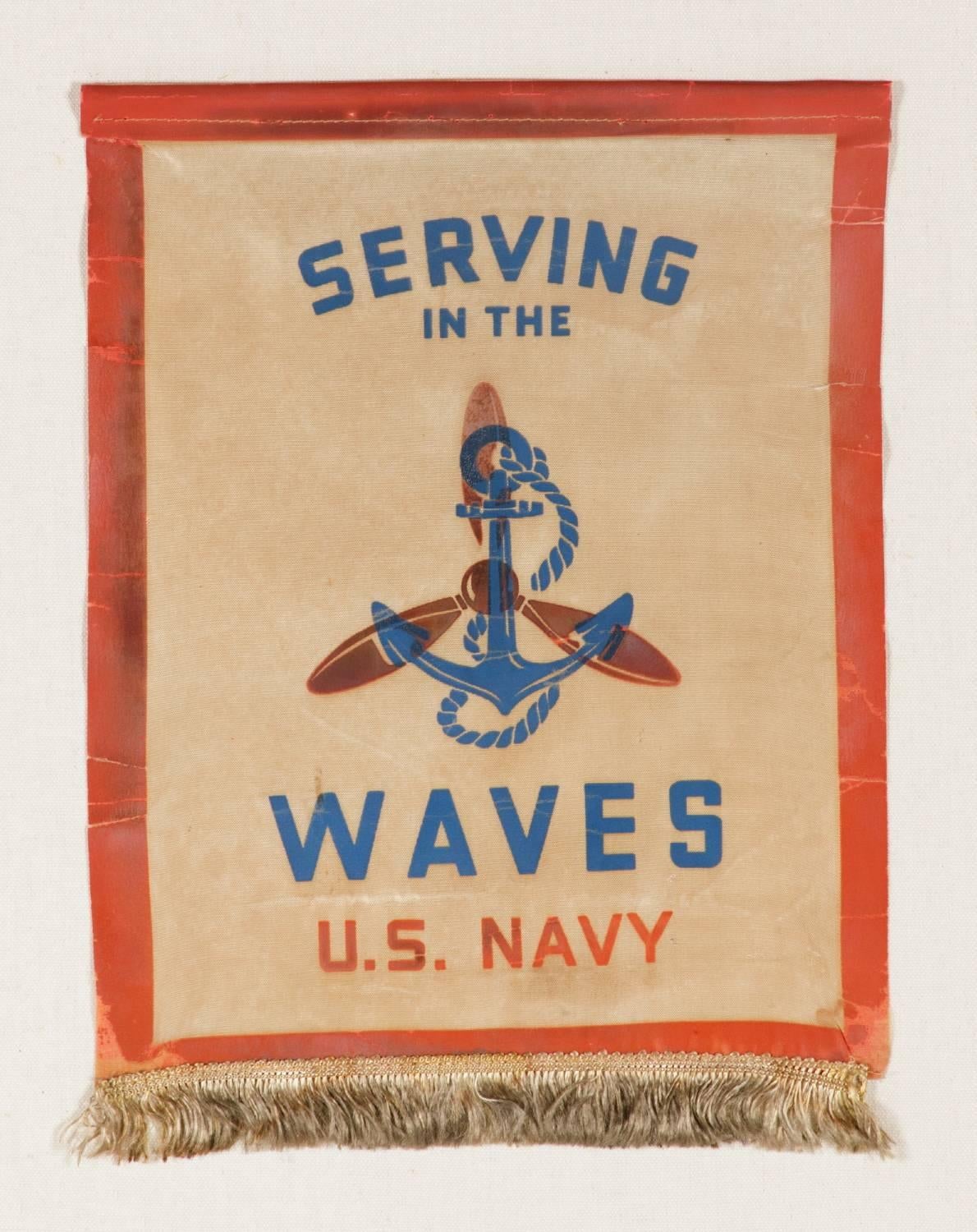 Serving In The Waves: An Extremely Rare WWII service banner for a woman in the U.S. Navy Reserves:

The practice of displaying a service banner became popular during WWI (U.S. involvement 1917-1918) and was continued or even increased during WWII