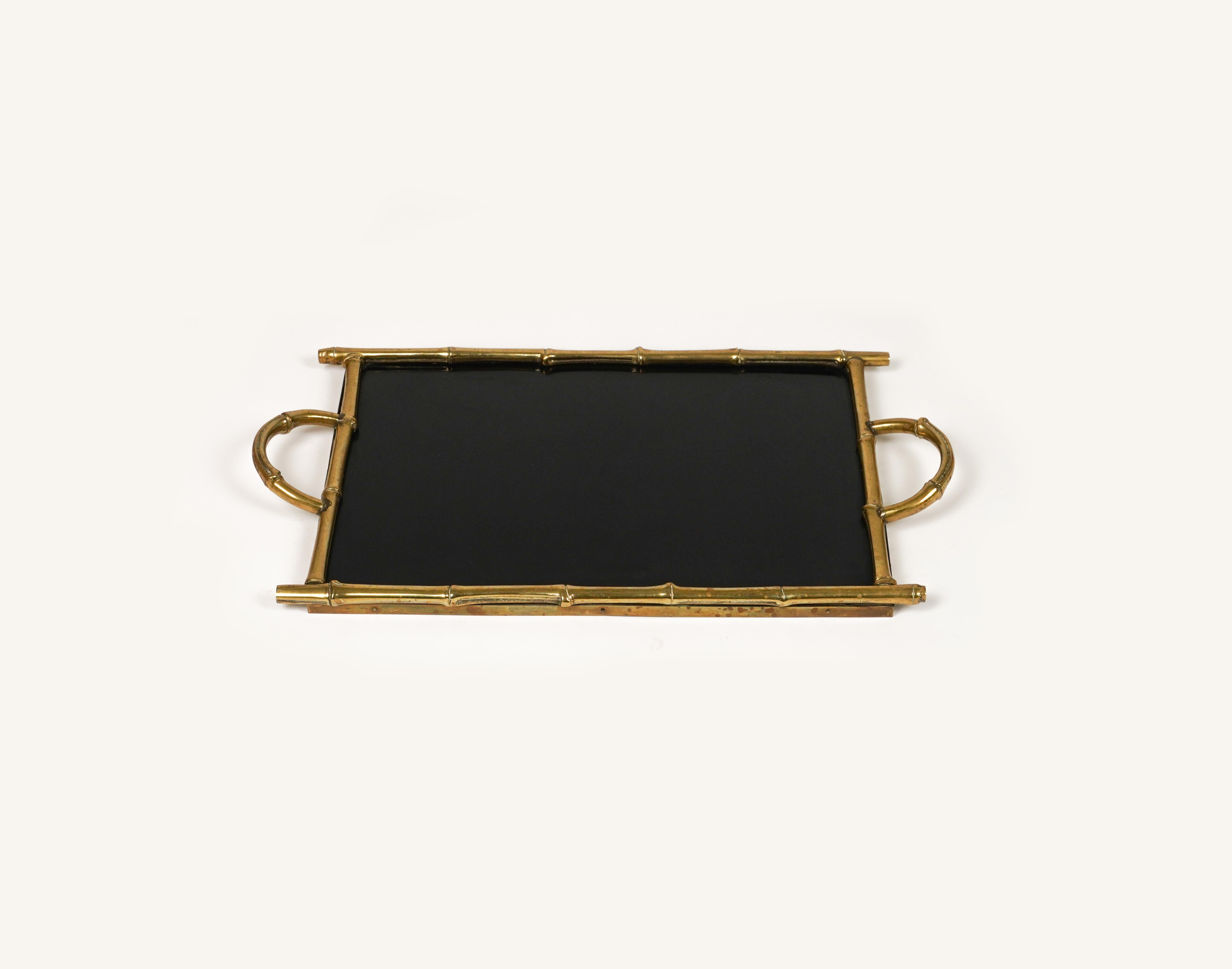 Midcentury amazing serving Tray in faux bamboo effect brass and black laminate attributed to Maison Bagues.

Made in France in the1960s.