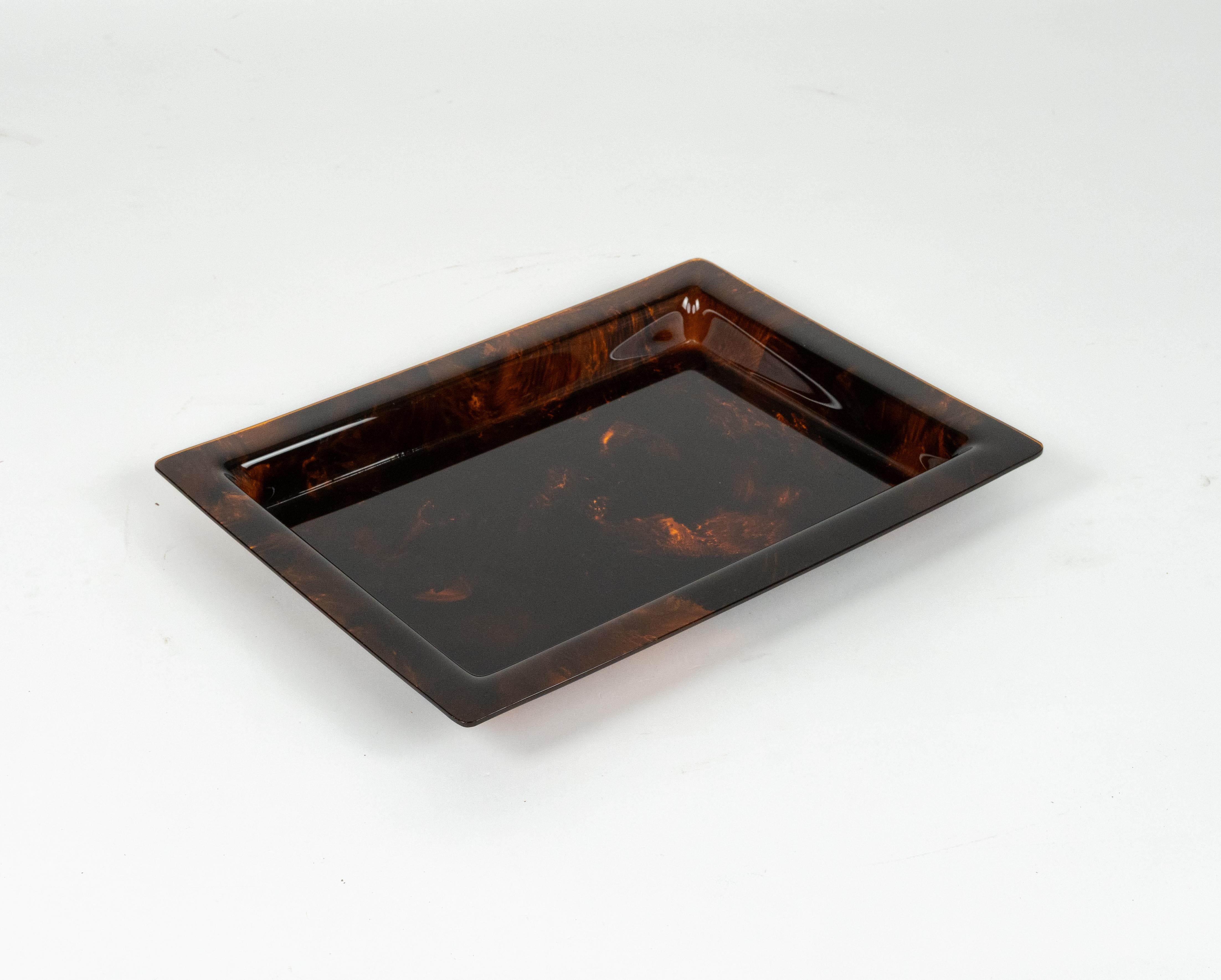 Midcentury amazing rectangular serving tray in faux tortoiseshell-effect lucite in the style of Christian Dior Home.  

Made in Italy in the 1970s.  

It's an iconic tray or plate made of lucite that will wow your guests and is perfect for a