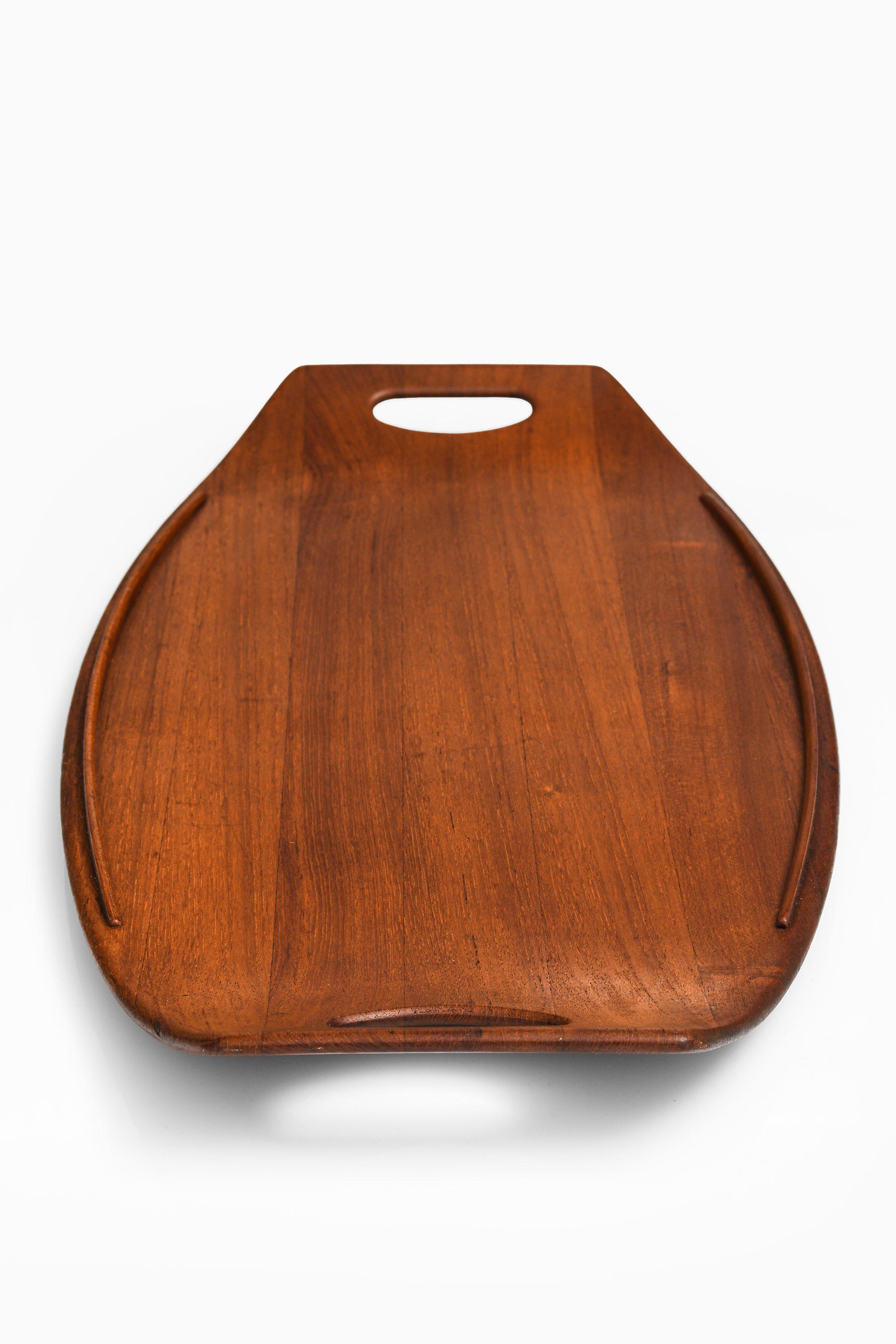 Serving Tray in Teak by Jens Quistgaard, 1950's

Additional Information:
Material: Teak
Style: Scandinavian, Mid century
Produced by Dansk in Denmark
Dimensions: (W x D x H): 68 x 32 x 4 cm
Condition: Good vintage condition, with small signs of usage