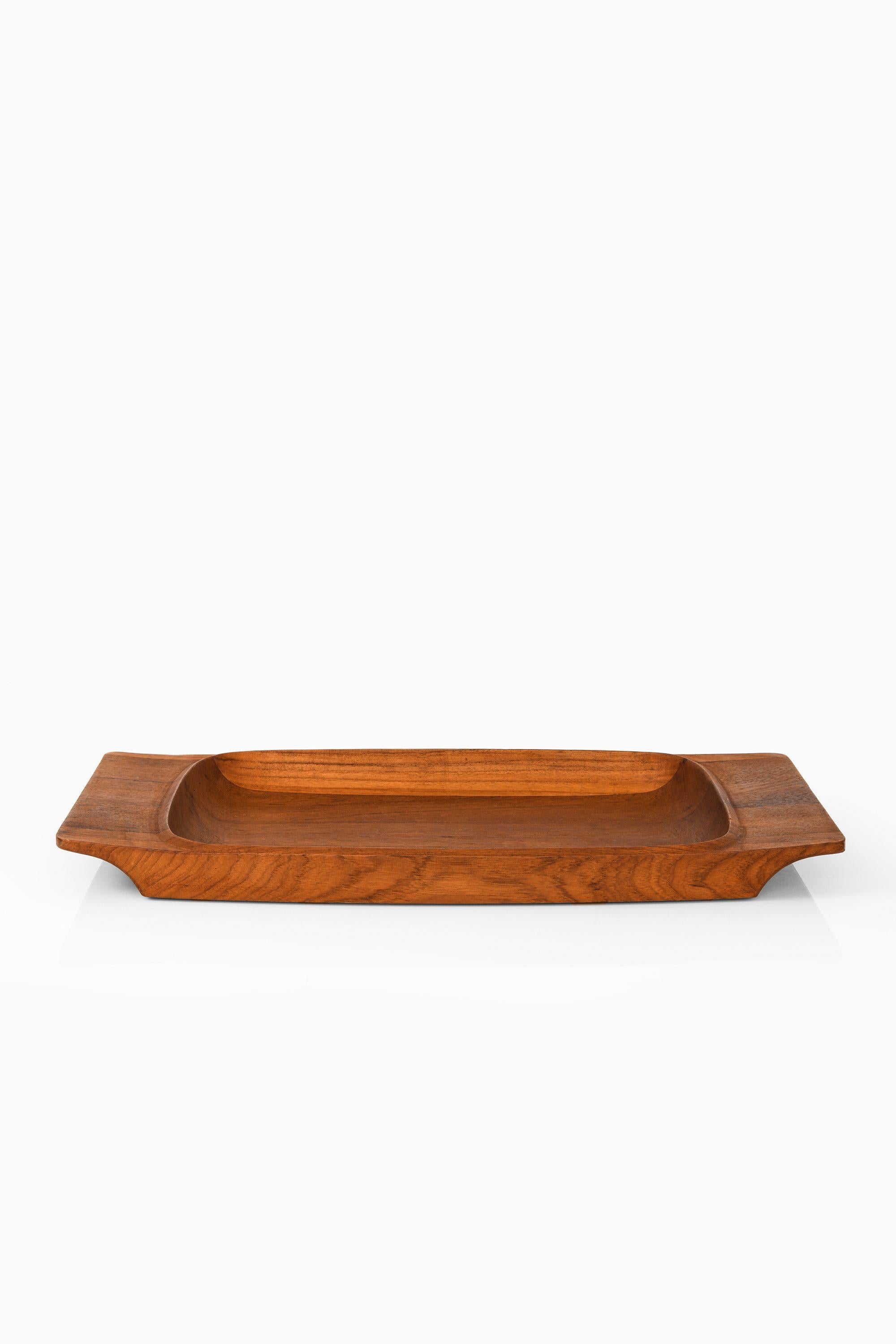Serving Tray in Teak by Jens Quistgaard, 1950's

Additional Information:
Material: Teak
Style: Mid century, Scandinavian
Produced by Dansk in Denmark
Dimensions (W x D x H): 57 x 32 x 4.5 cm
Condition: Good vintage condition, with small signs of