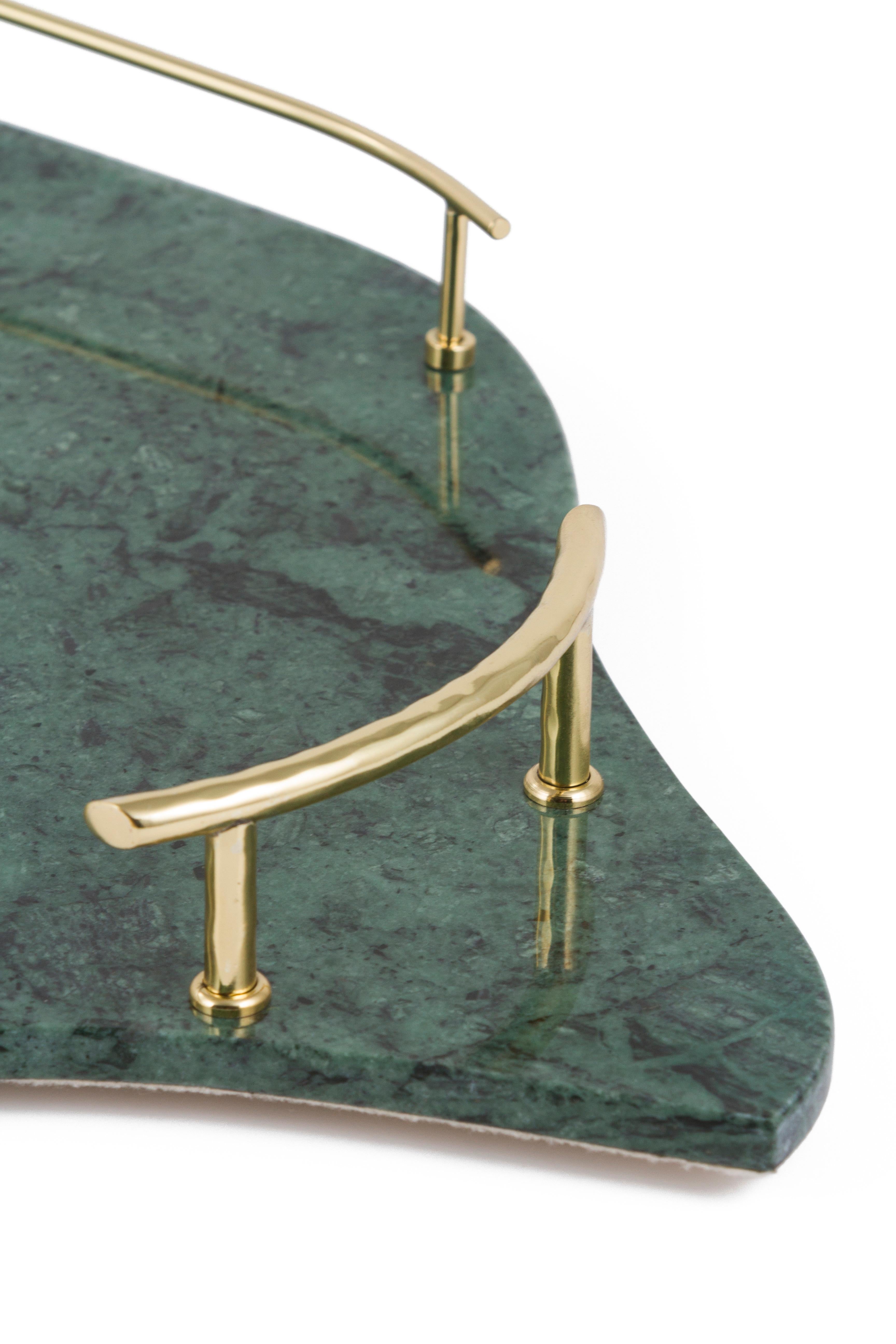 Serving Tray Sakai, Lusitanus Home Collection, Handcrafted in Portugal - Europe by Lusitanus Home.

A sublime serving tray, Sakai was design to uplift layback moments. An organic-shape serving tray in Green Guatemala marble with brass handles in