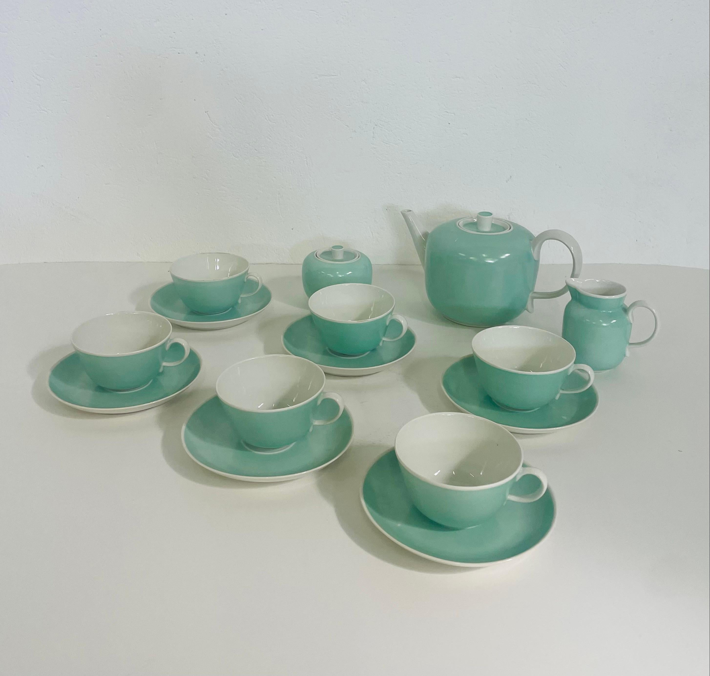 Beautiful Tea service, deisgner Giovanni Gariboldi and produced by Richard Ginori.
Composedof 6 cups with saucer, 1 teapot, 1 sugar bowl and 1 milk jug.
Ceramic material colored in light blue.
Manufacturer's mark under each piece 
Dimensions
Teapot